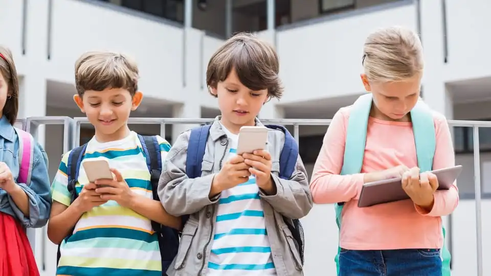 Children using mobile phone 