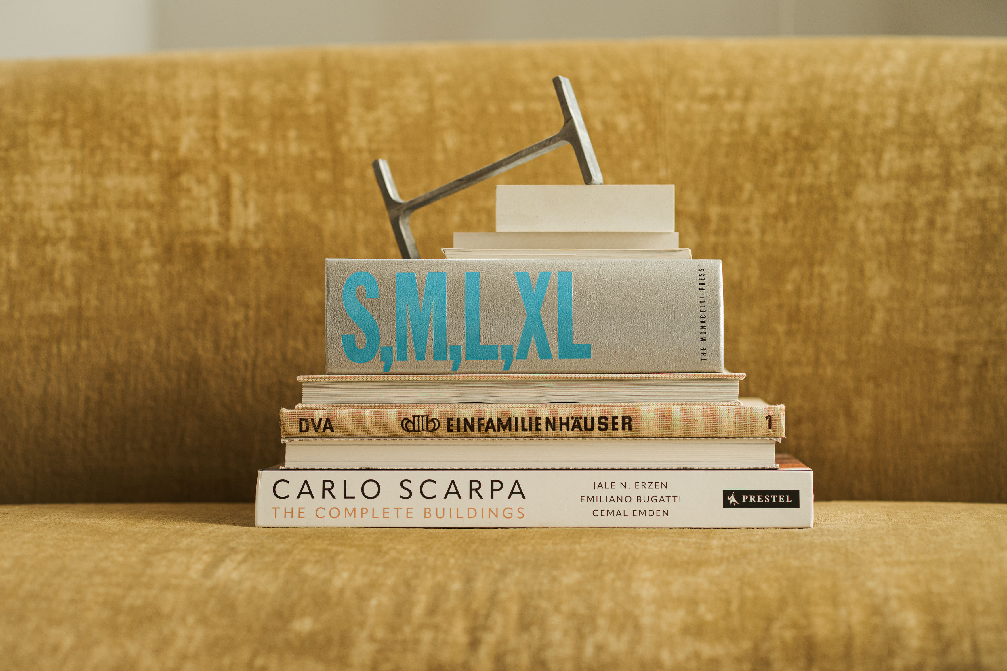 Abstract image of colorful shiny surface with Konkreet yellow diagonal stripe on it.