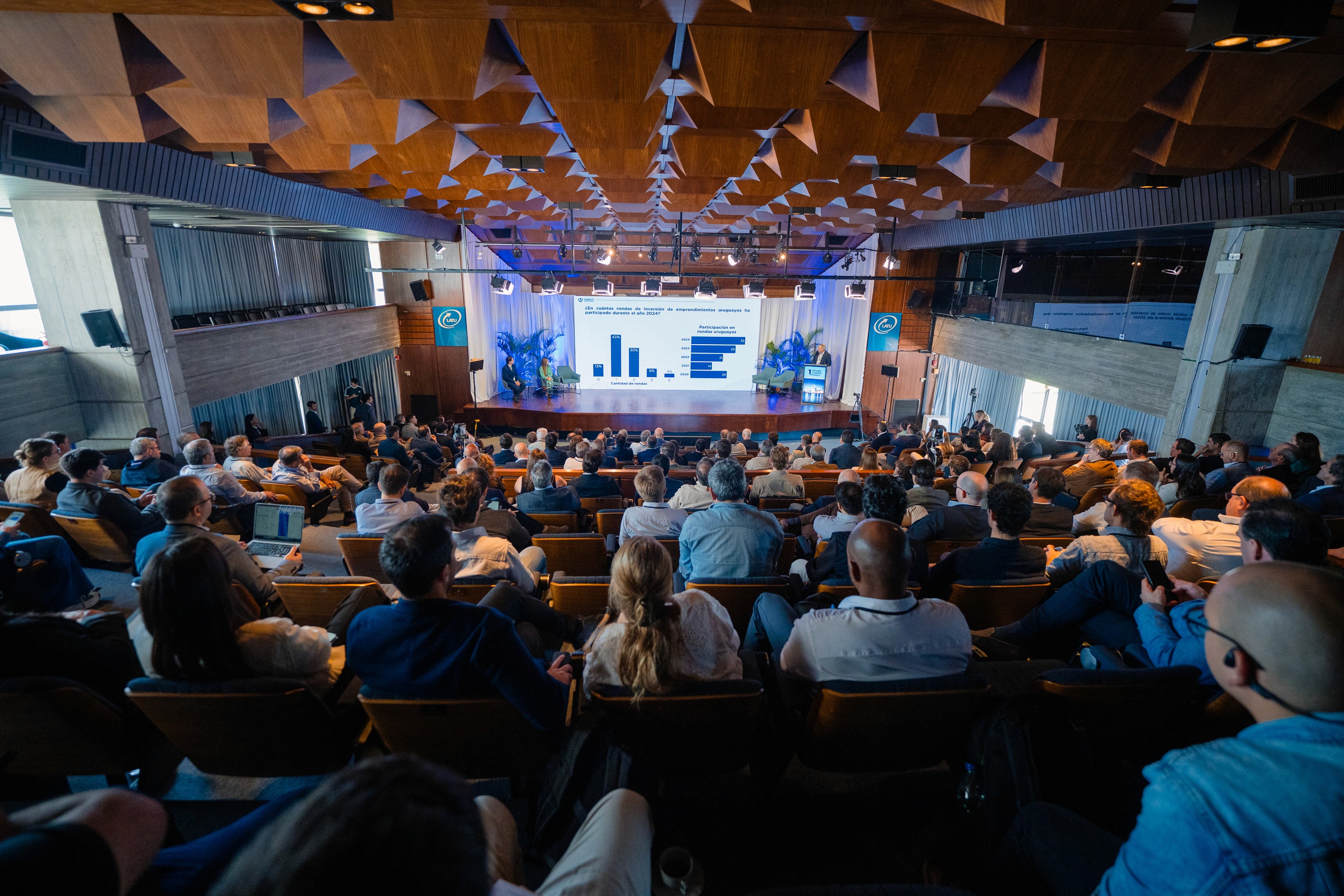 people sitting on chair in front of laptop computers