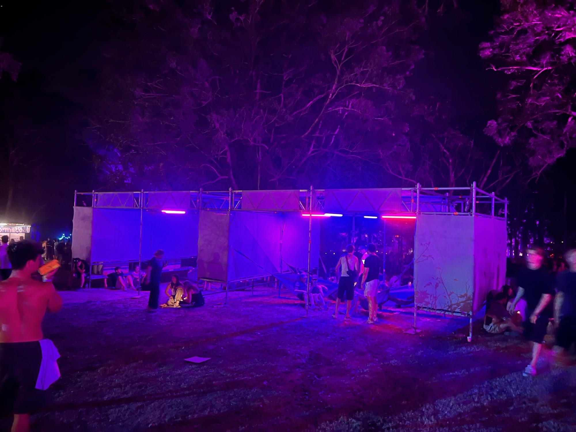 The hangout area, by day and by night. Same structure, different festival.