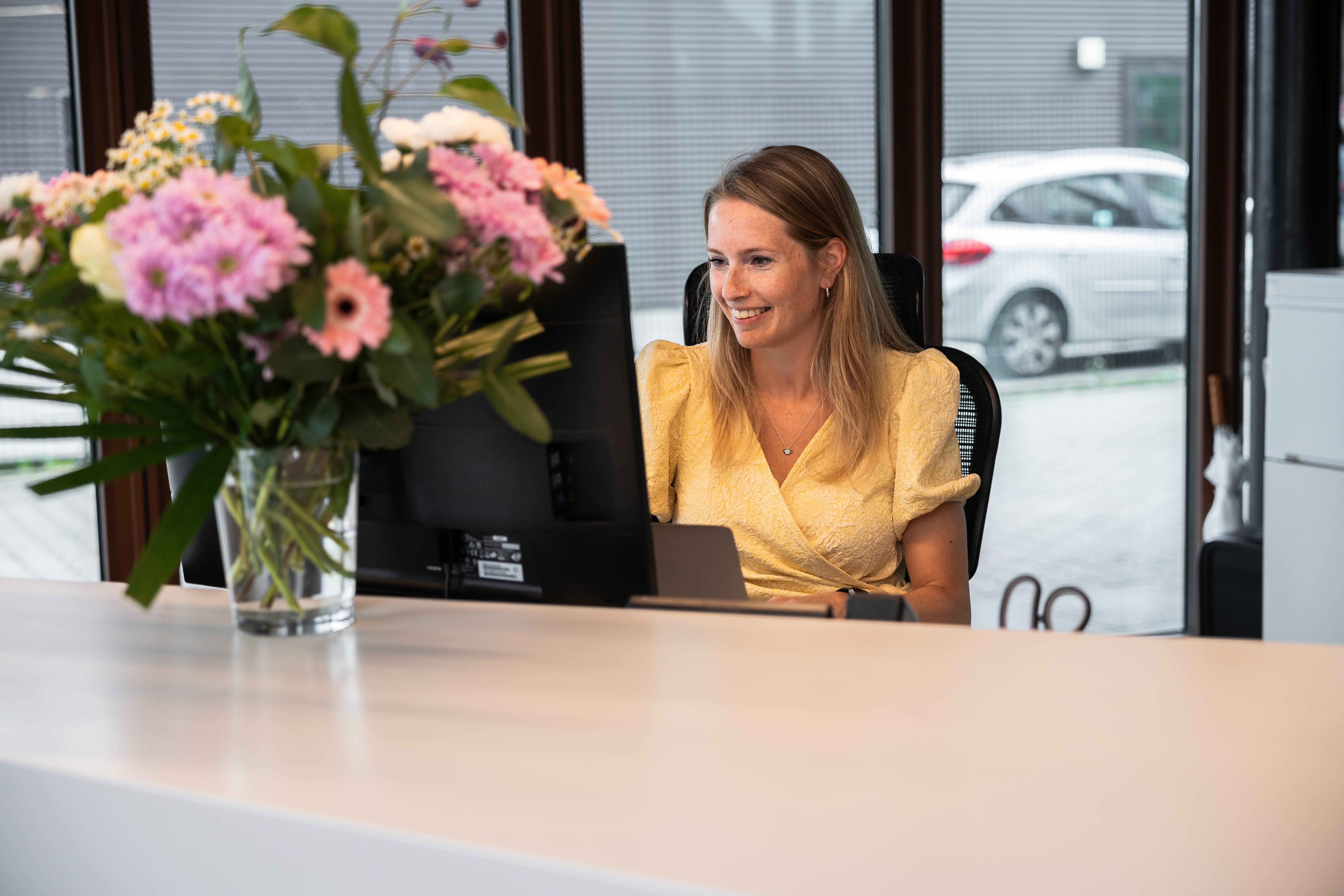 red rose on notebook near MacBook