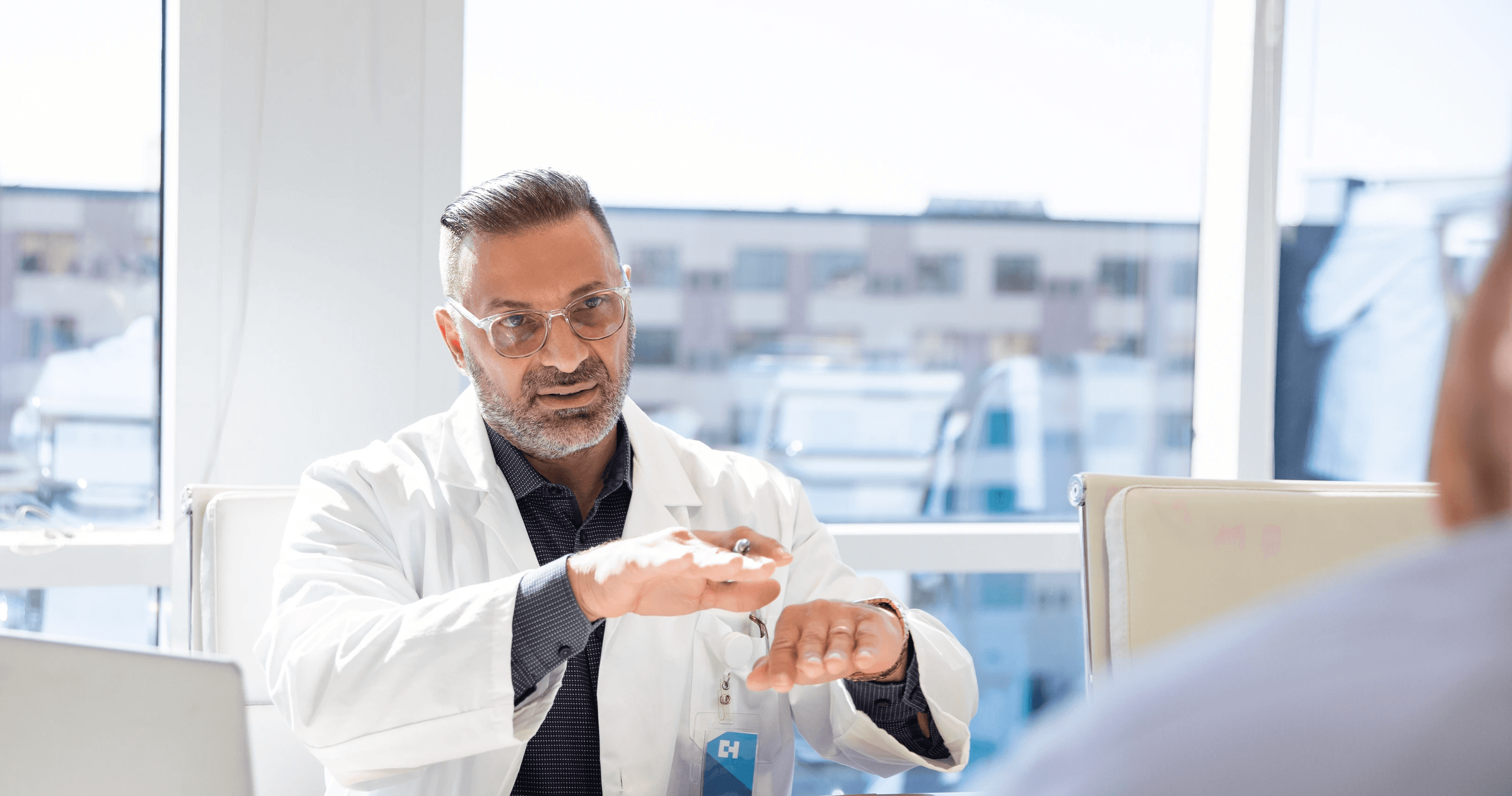 A doctor consults with a patient