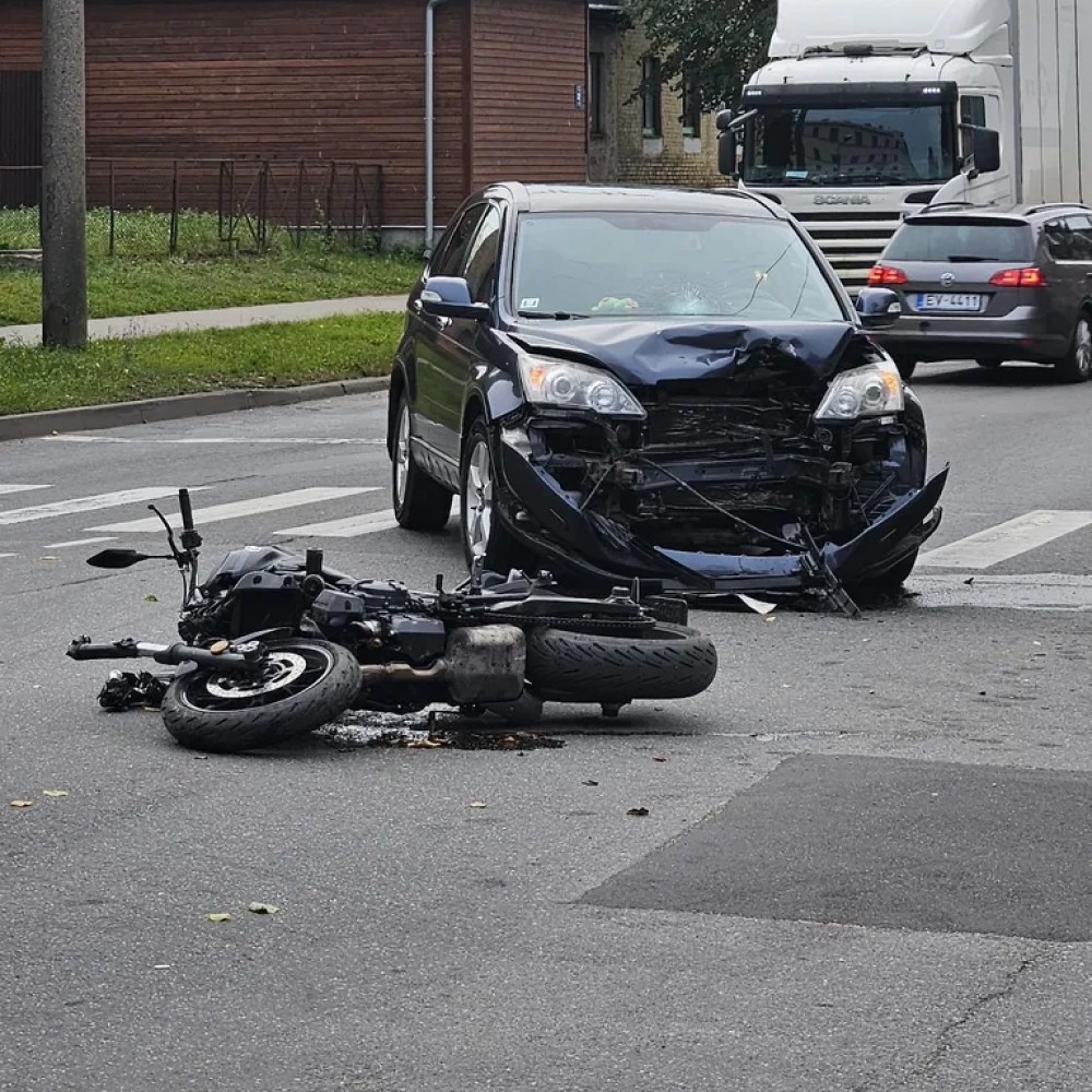 Collision between a motorcycle and a car