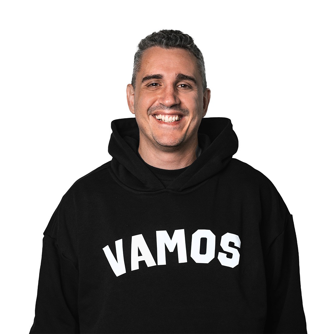 headshot of male in dark background