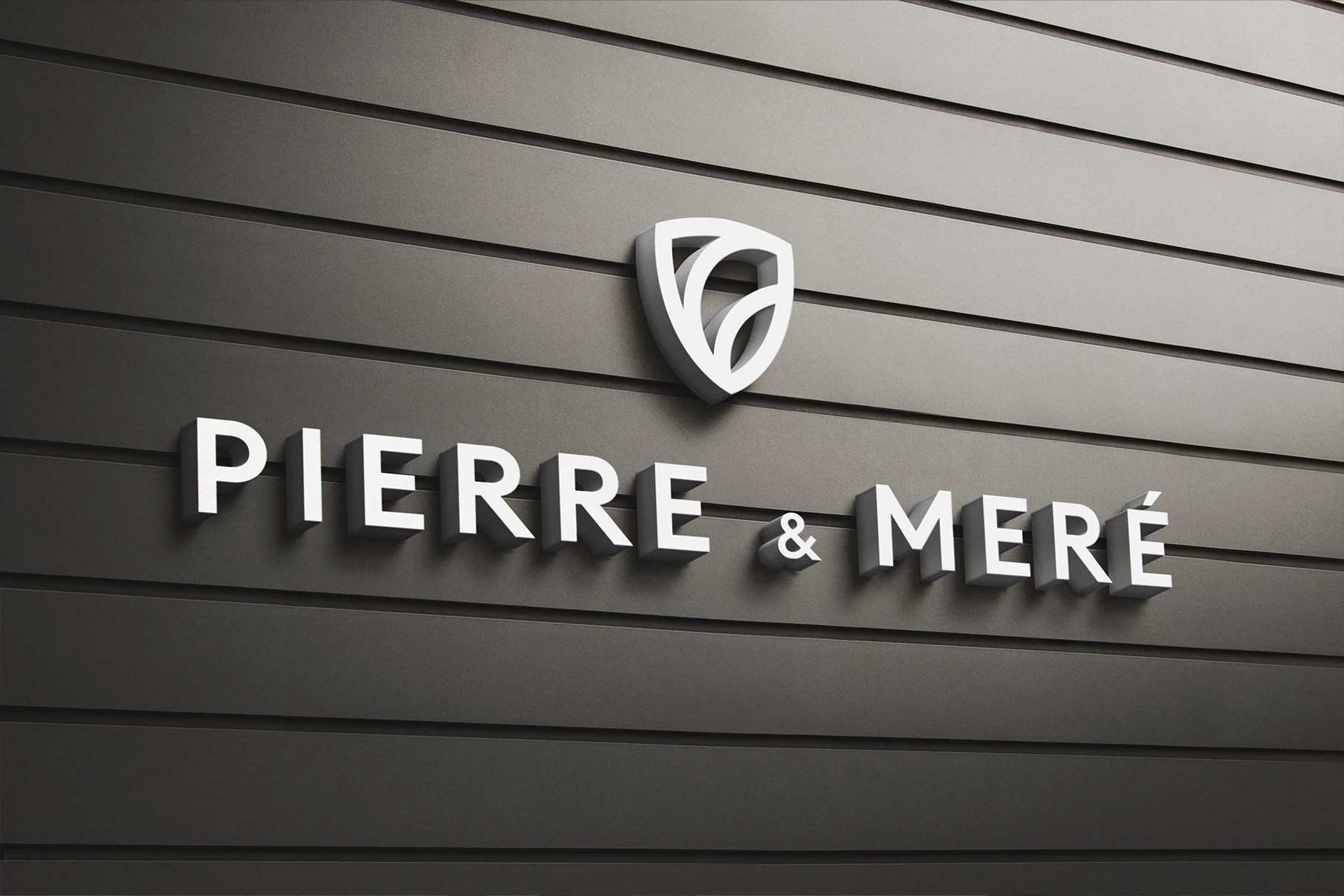 3D wall logo mockup with white lettering shown in a perspective view.