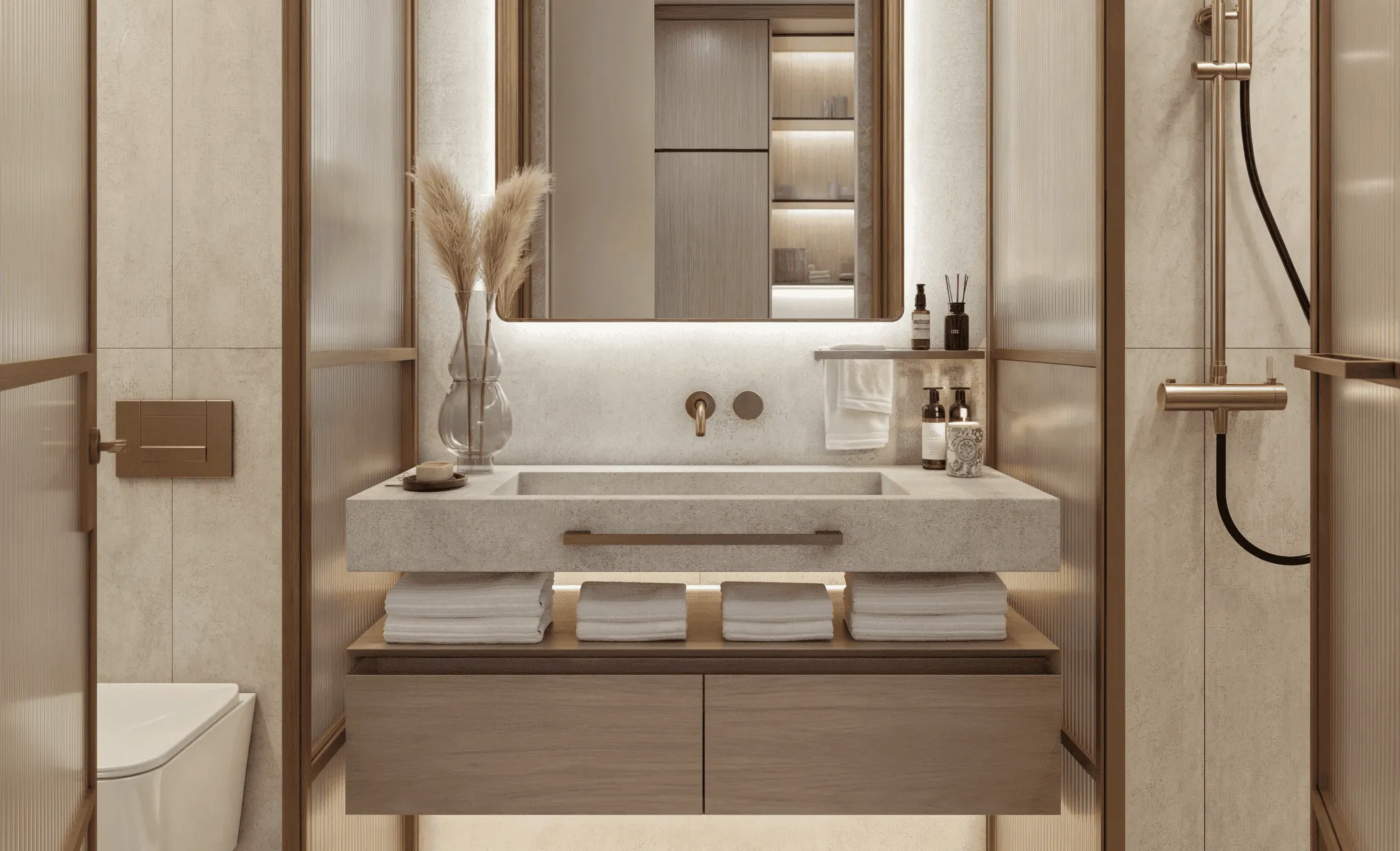 Bathroom with sink, toilet, and shower designed for efficiency.