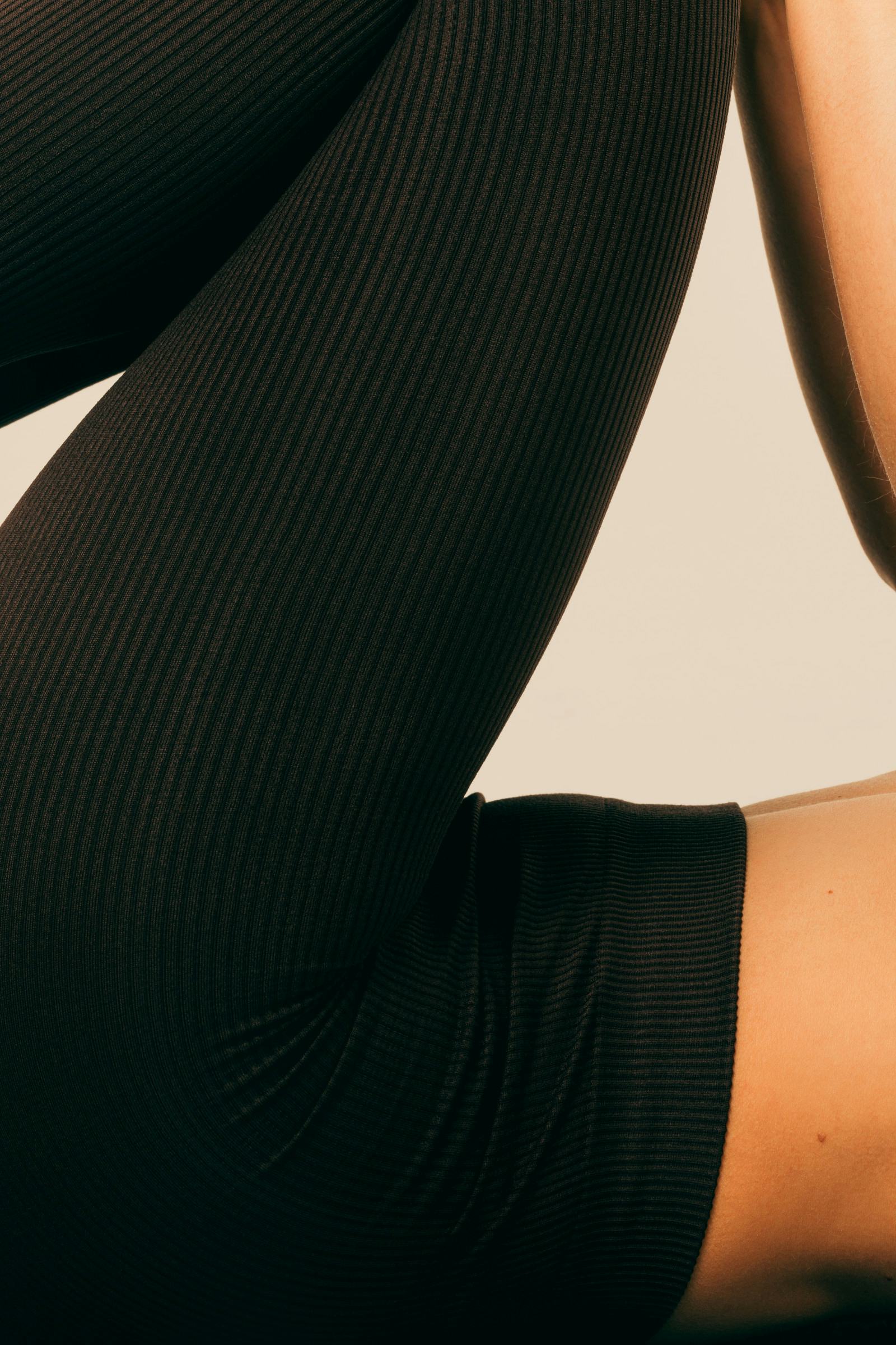 Soft, abstract portrait of a woman in profile, rendered with horizontal light lines.