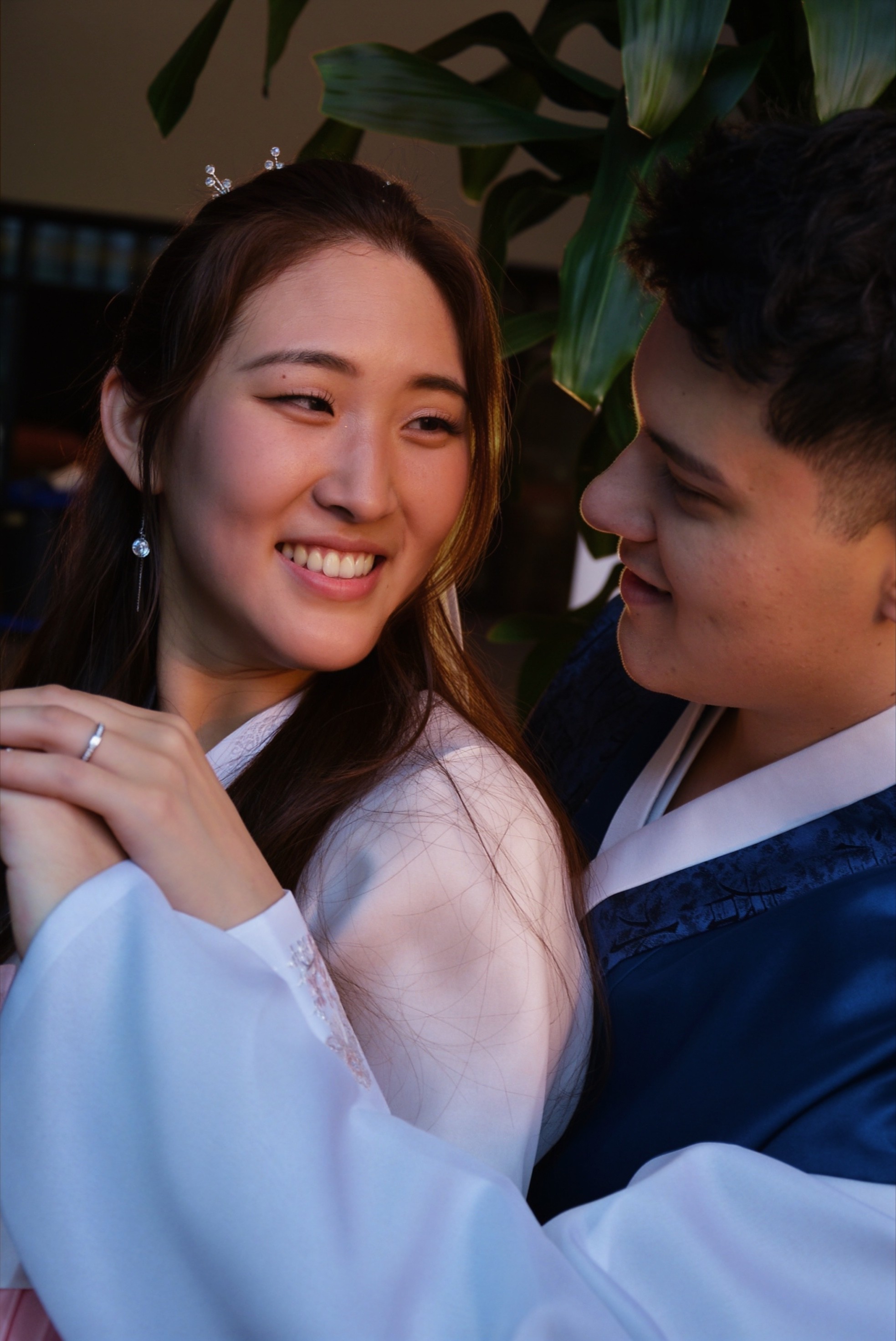 Bride laughing in hanbok at golden hour — Korean wedding photographer Atlanta