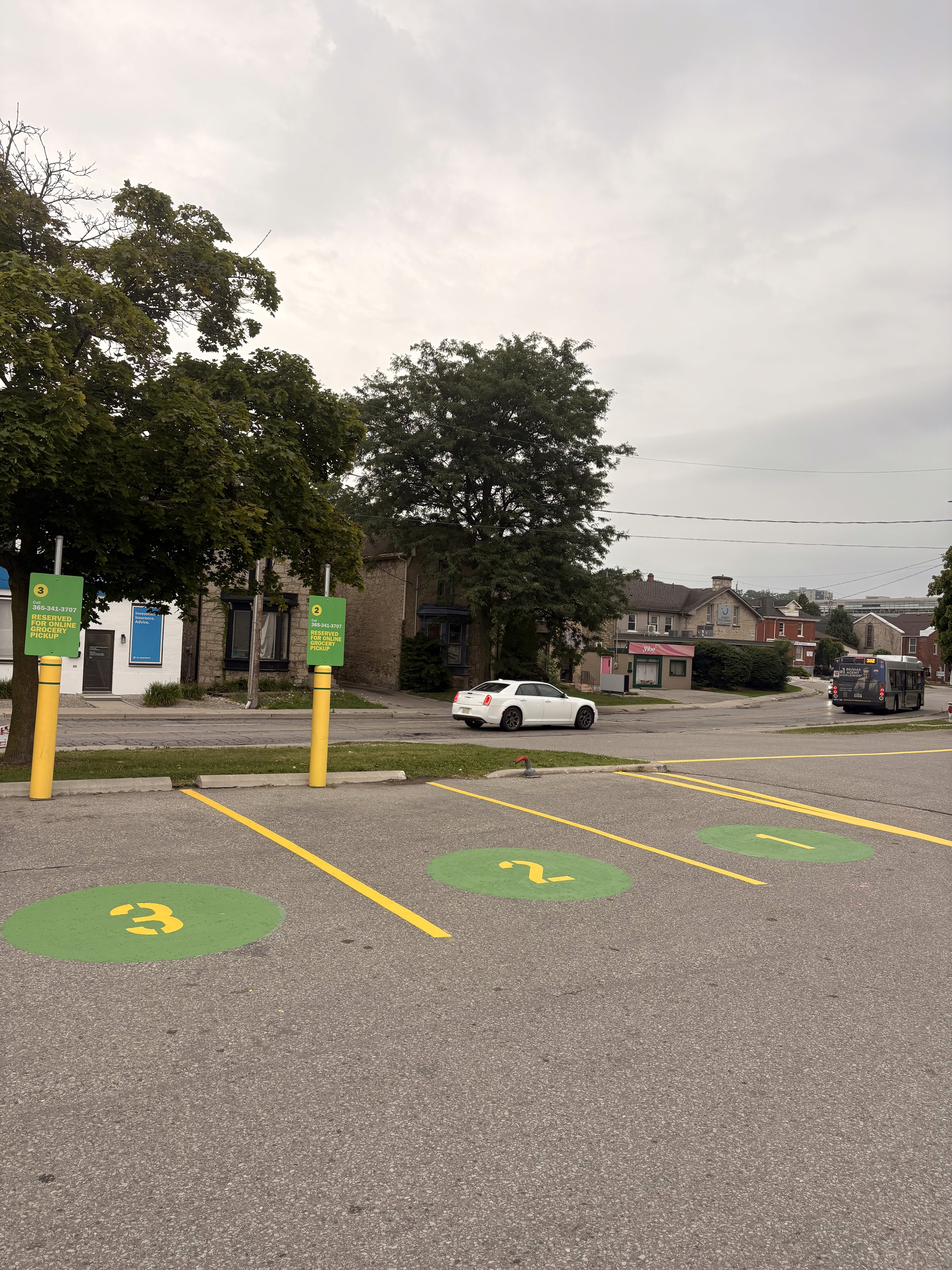 Reserved parking stall and accessible pavement markings painted by Sosa Standard Line Painting