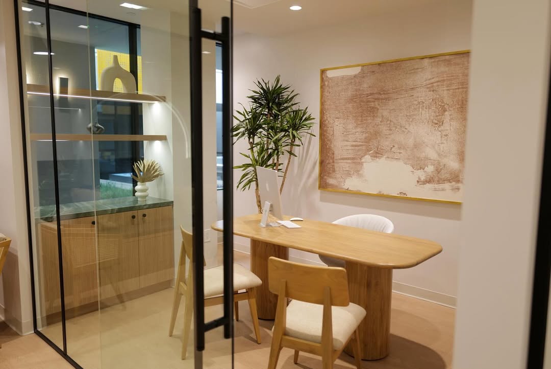 Orthodontic treatment room with dental chair and built-in cabinetry at Alinea Orthodontics clinic.