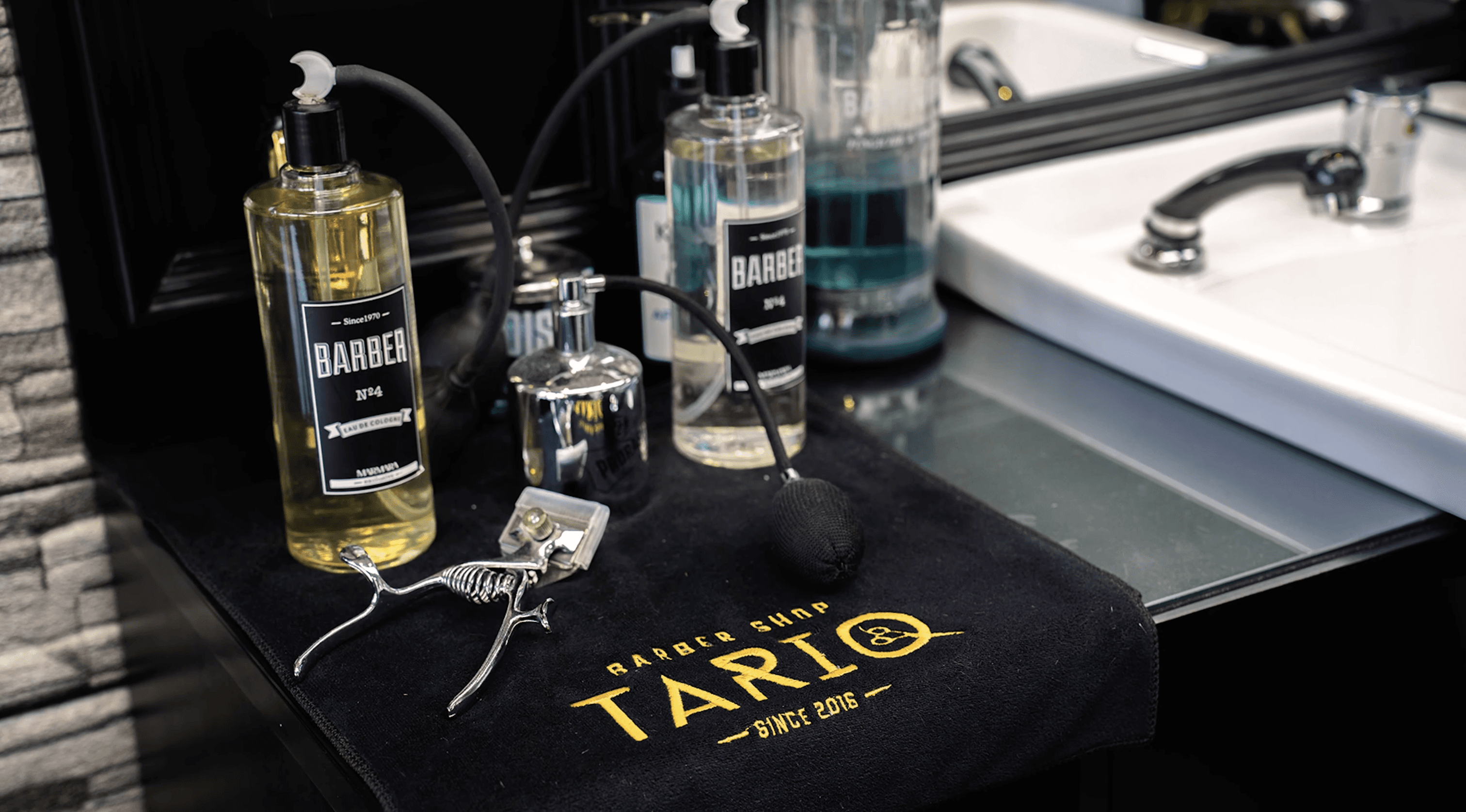 Barber relaxing and talking with client