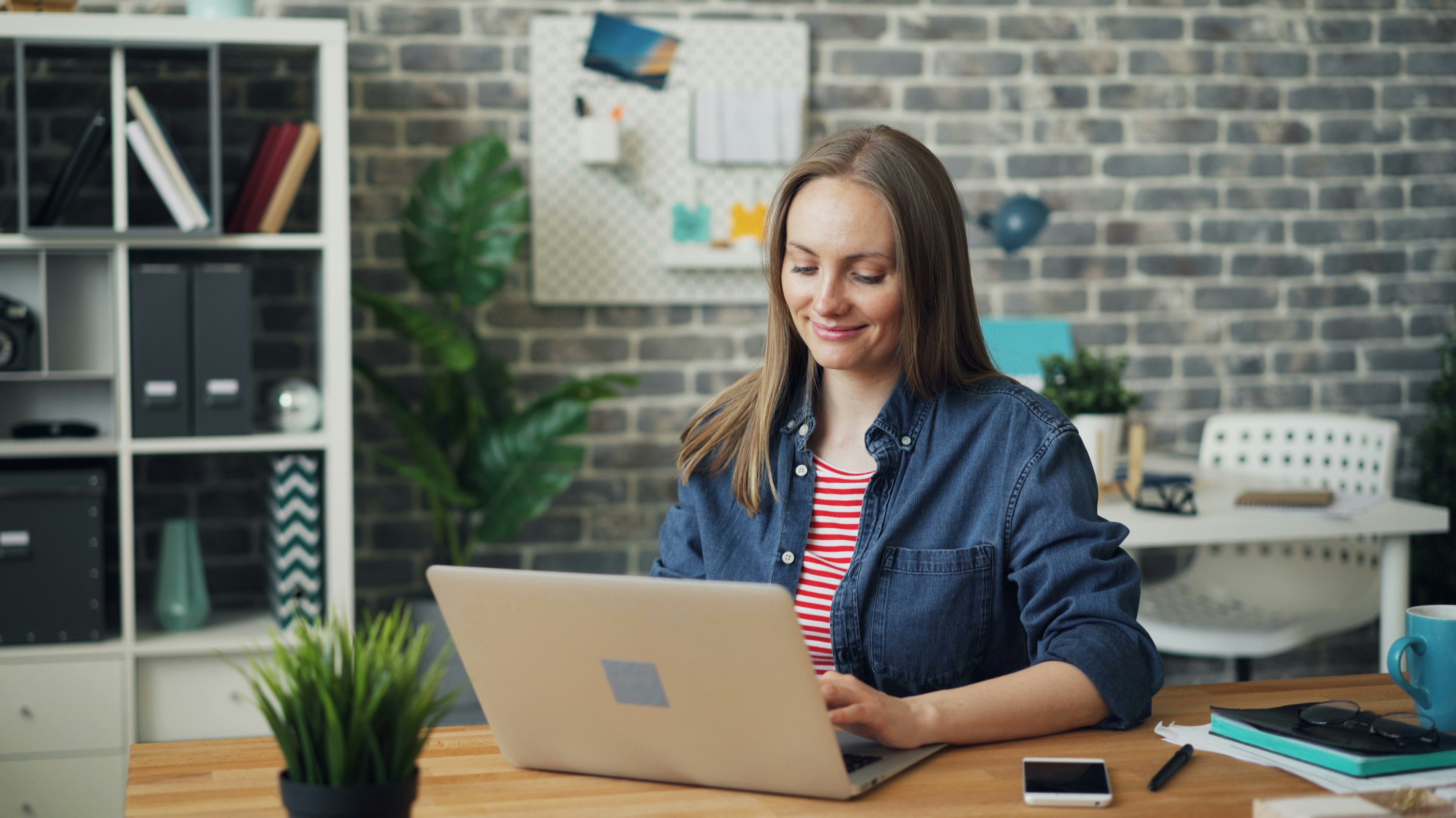 person looking at her computer - ChatGPT File Uploader