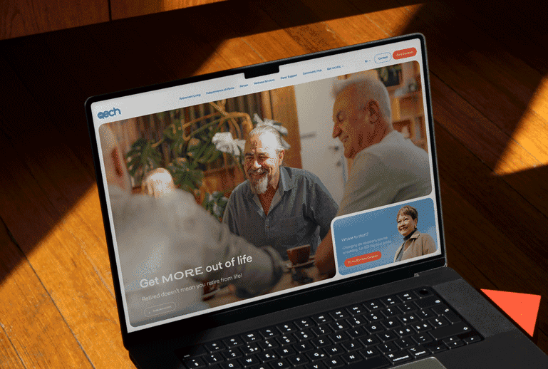 The 'ECH' Website displayed on a laptop sitting on a bench.