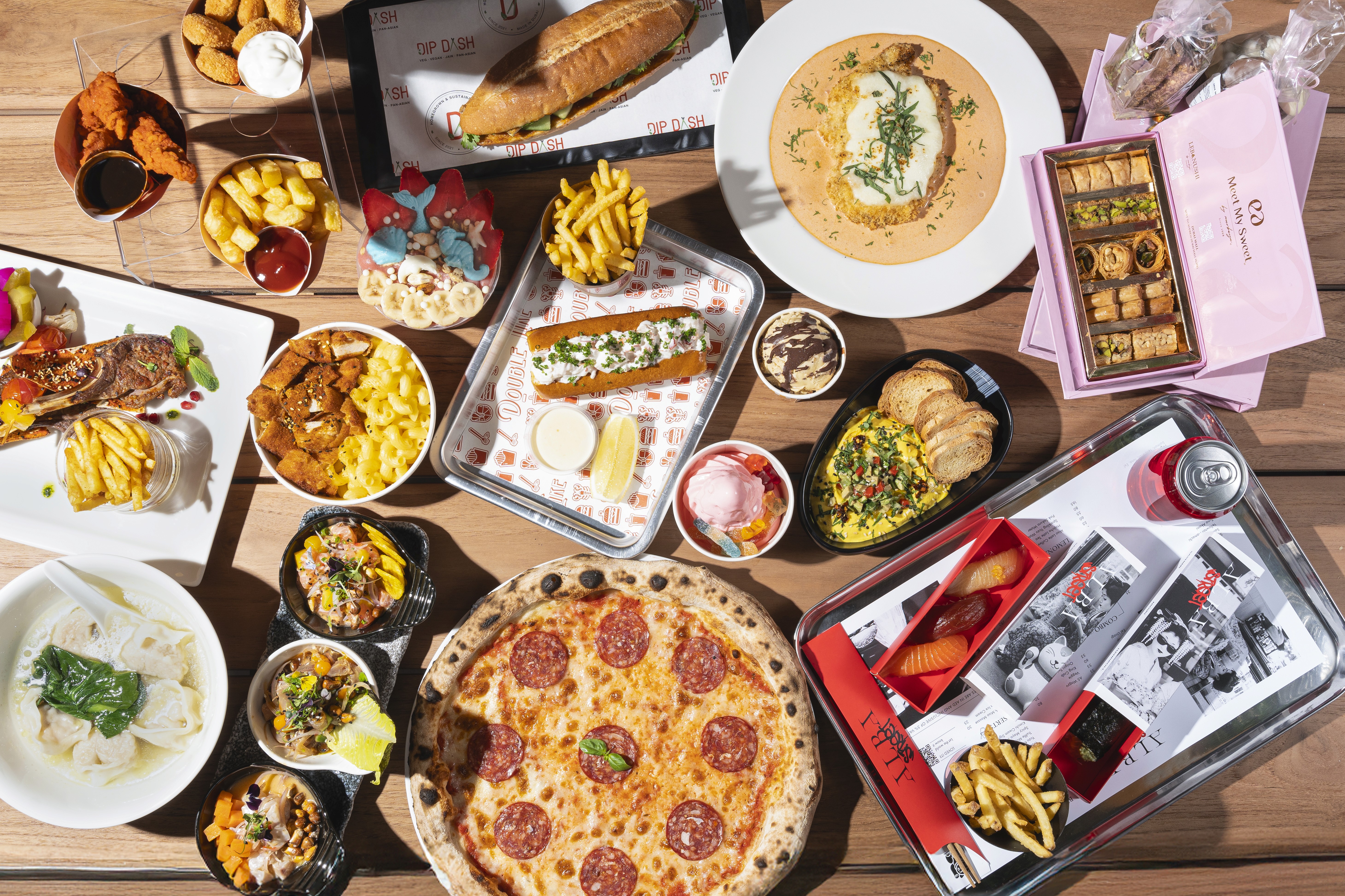 A mix of burgers, pizzas, and specialty coffee at Social Distrikt, perfect for food lovers exploring what to eat in the Dubai Mall