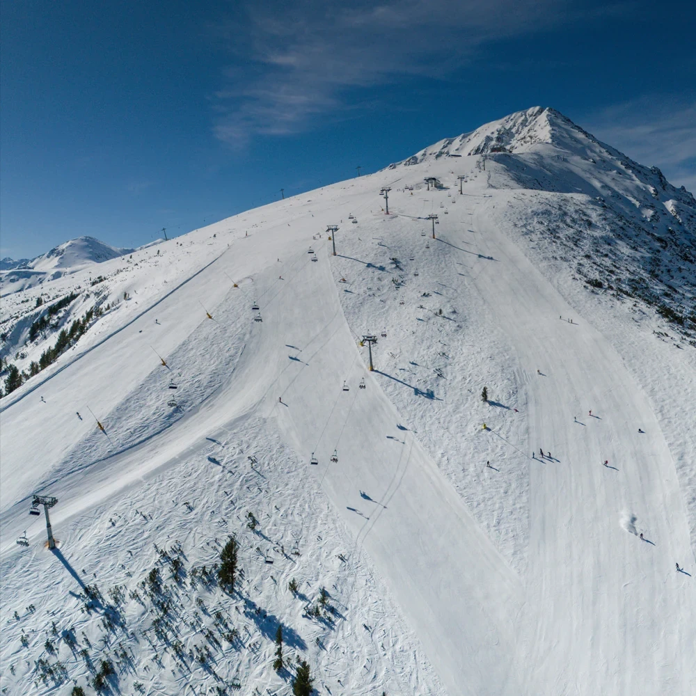 Snow-covered mountain peaks above Bansko
