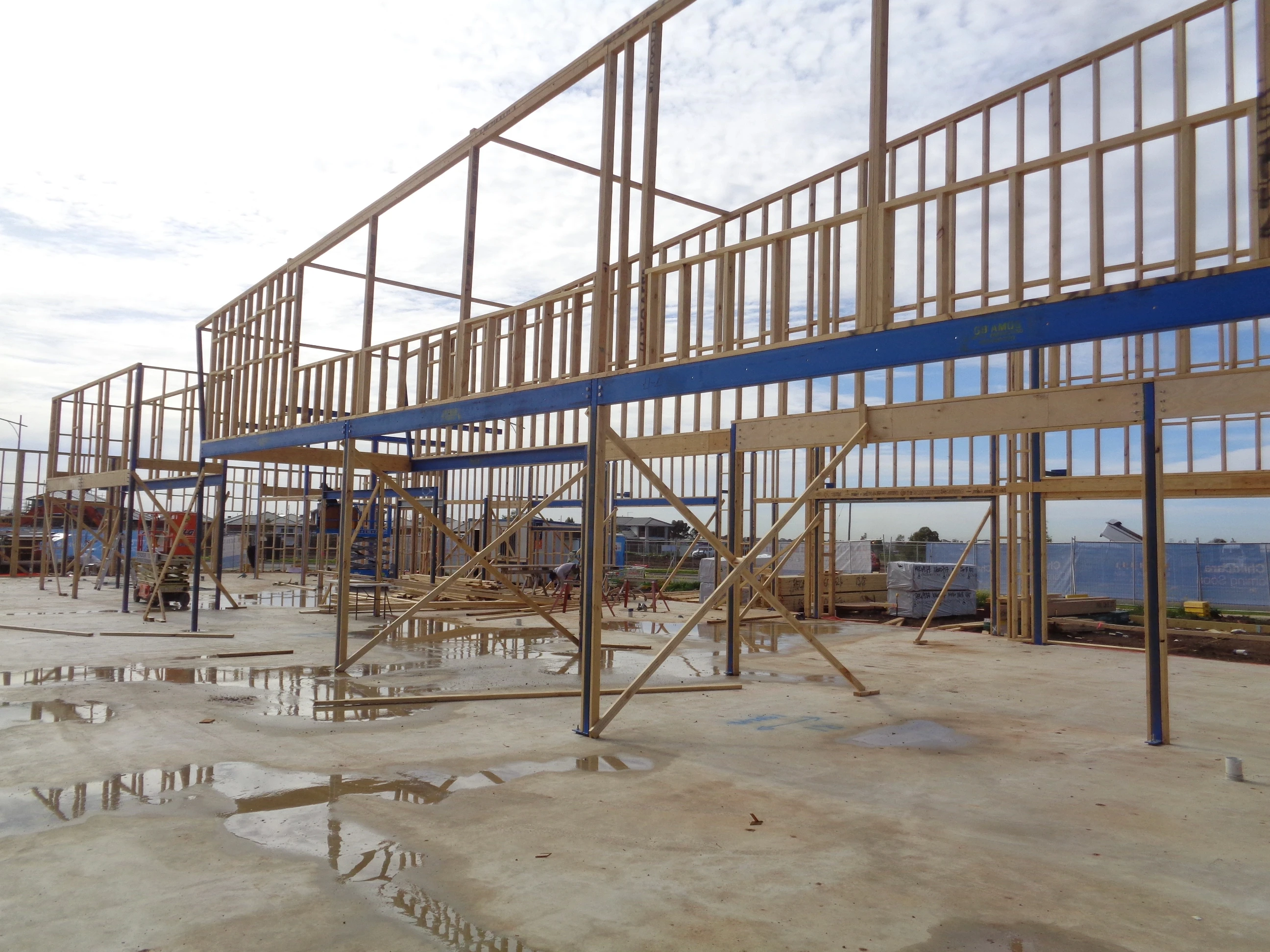 Image of residential architectural house with a car in the driveway by SubsQS Ltd