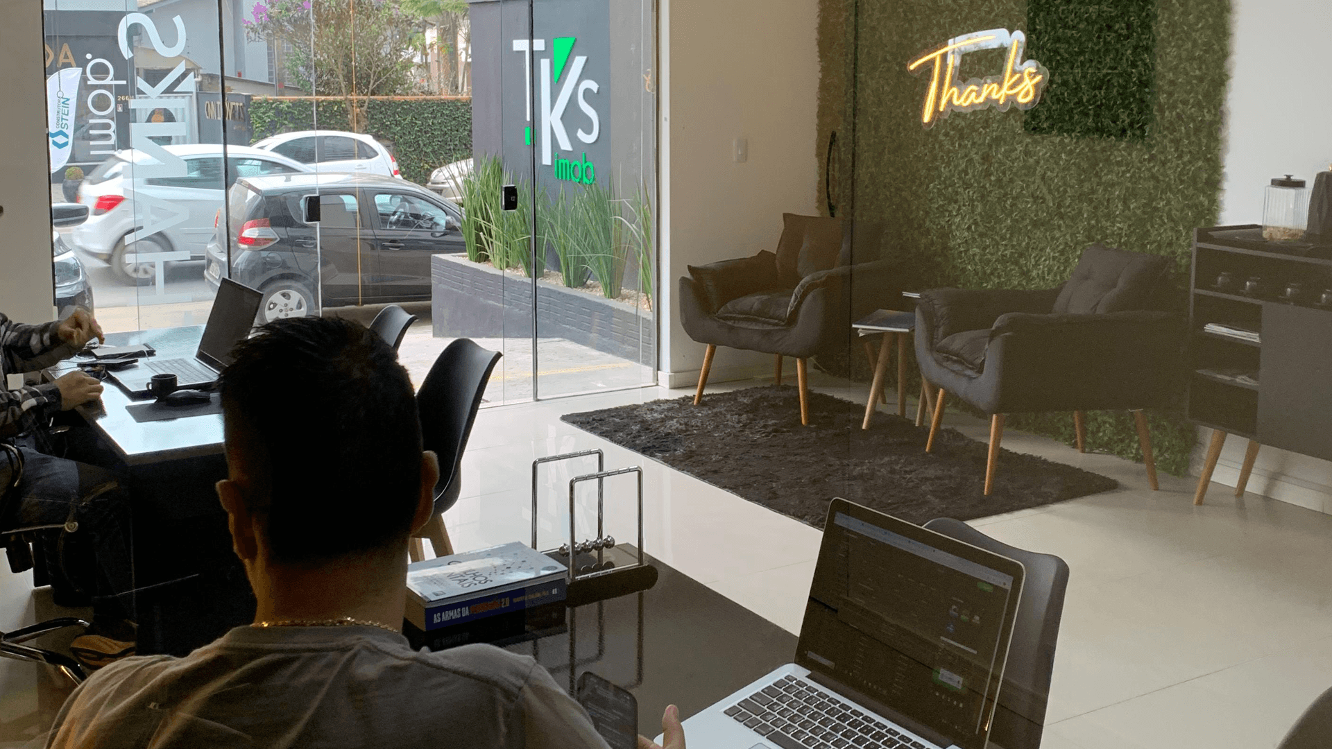 The front of a building with the name of a company