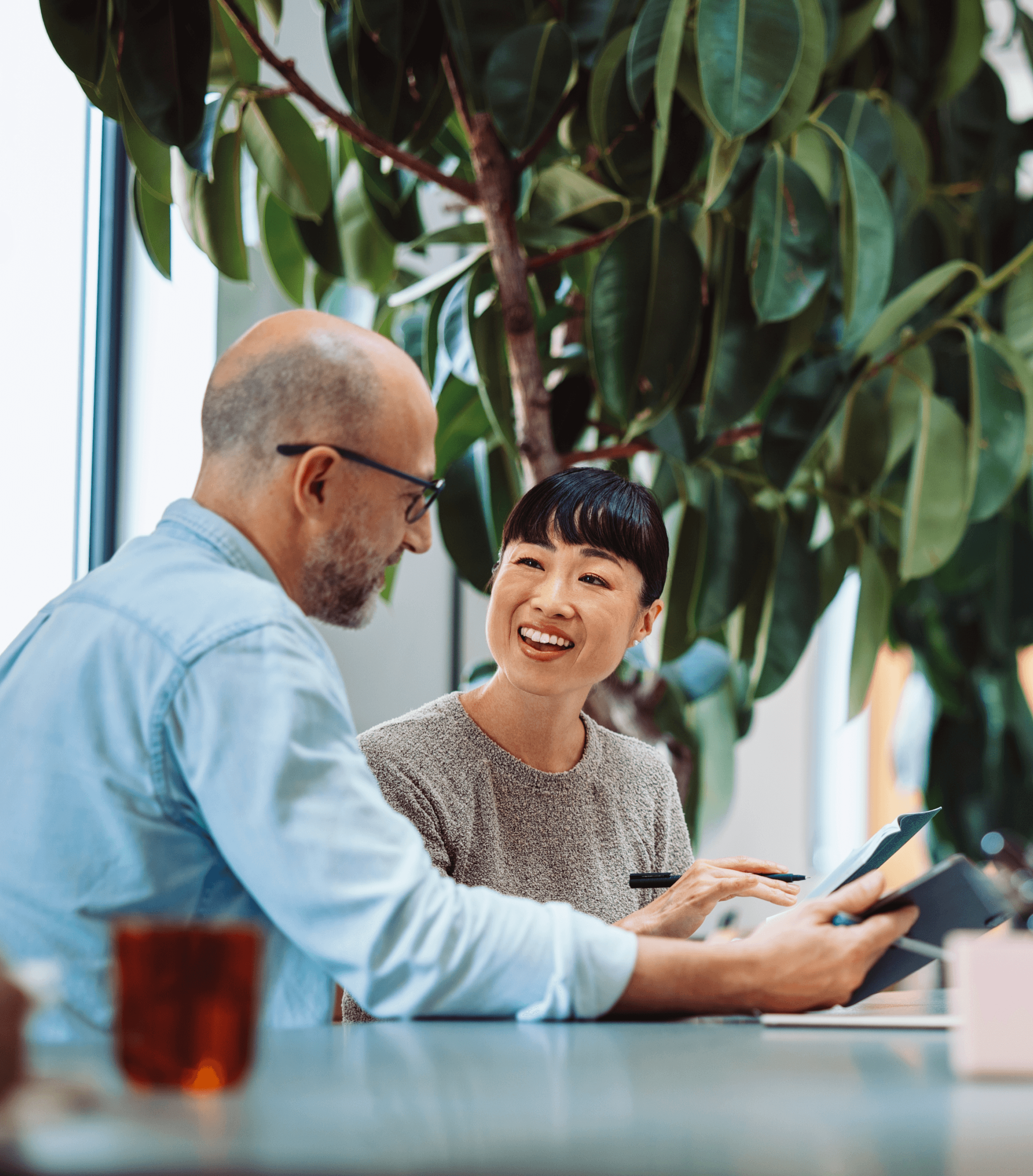 lawyer discussing paperwork with client