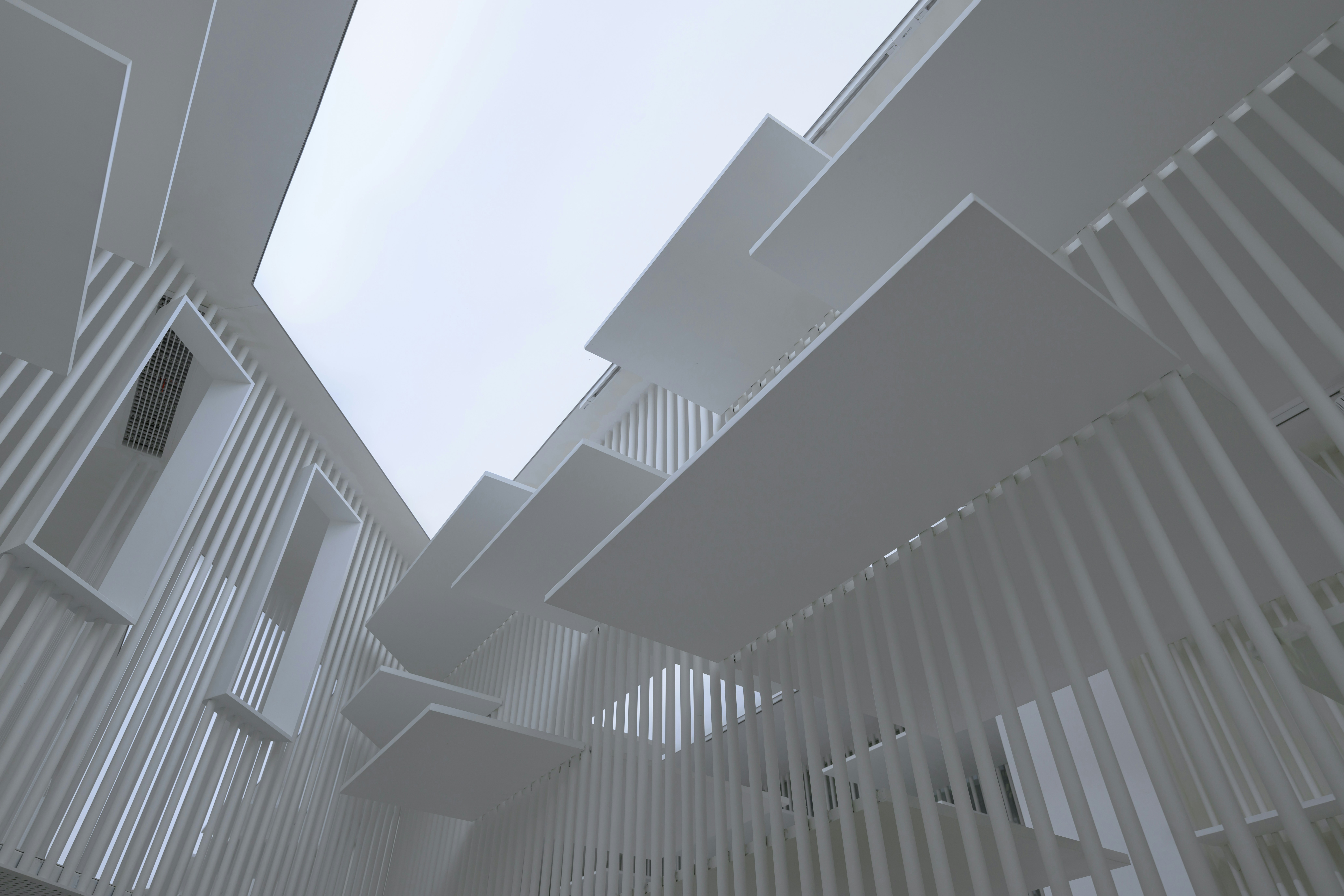 A very tall building with a sky in the background