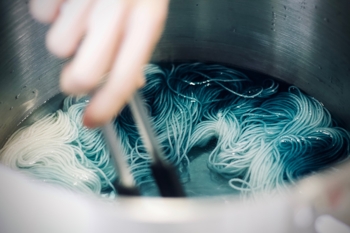 Skeins turning in the woad vat