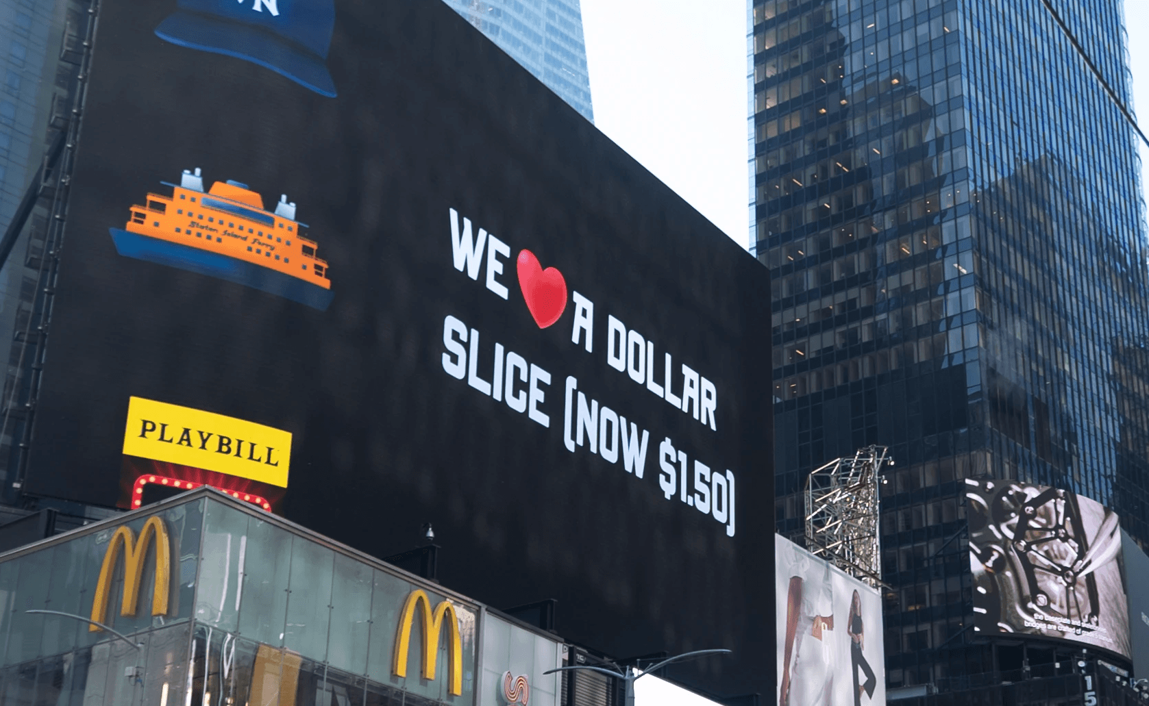 Billboard in Times Square that reads "We love a dollar slice (now $1.50)