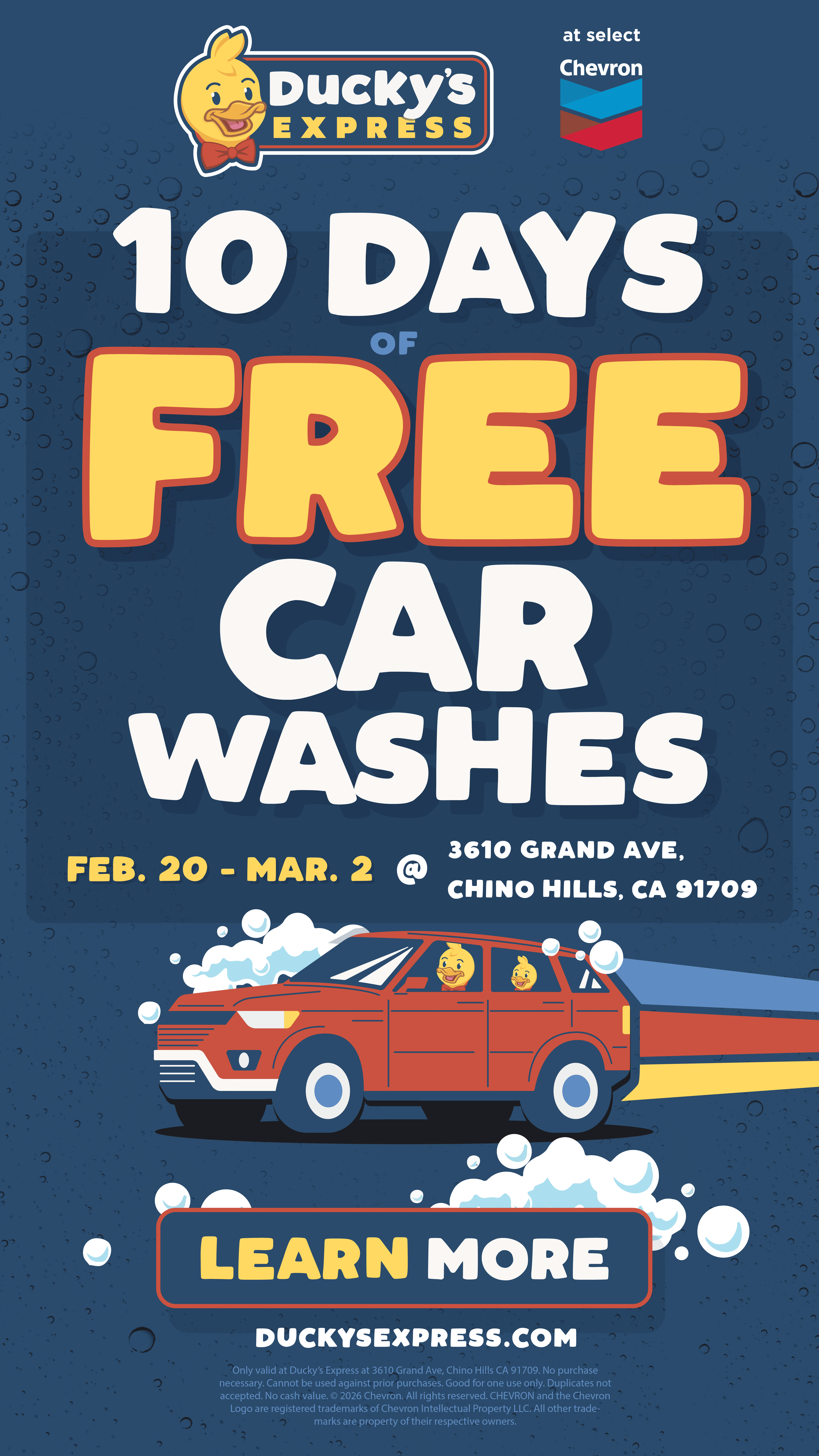 Black and white photo of two people looking at a computer screen with papers on wall