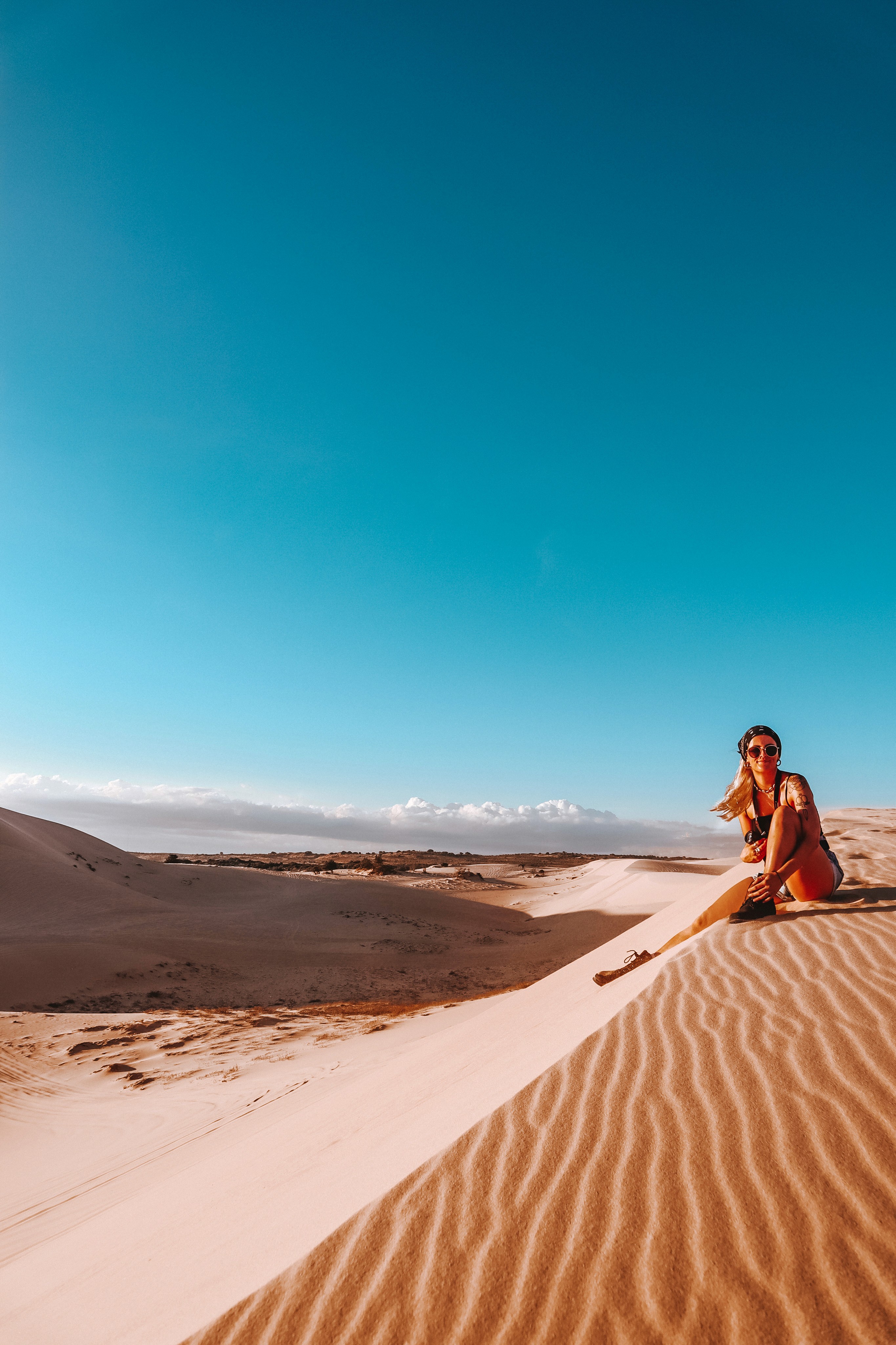 Girl on sand dune