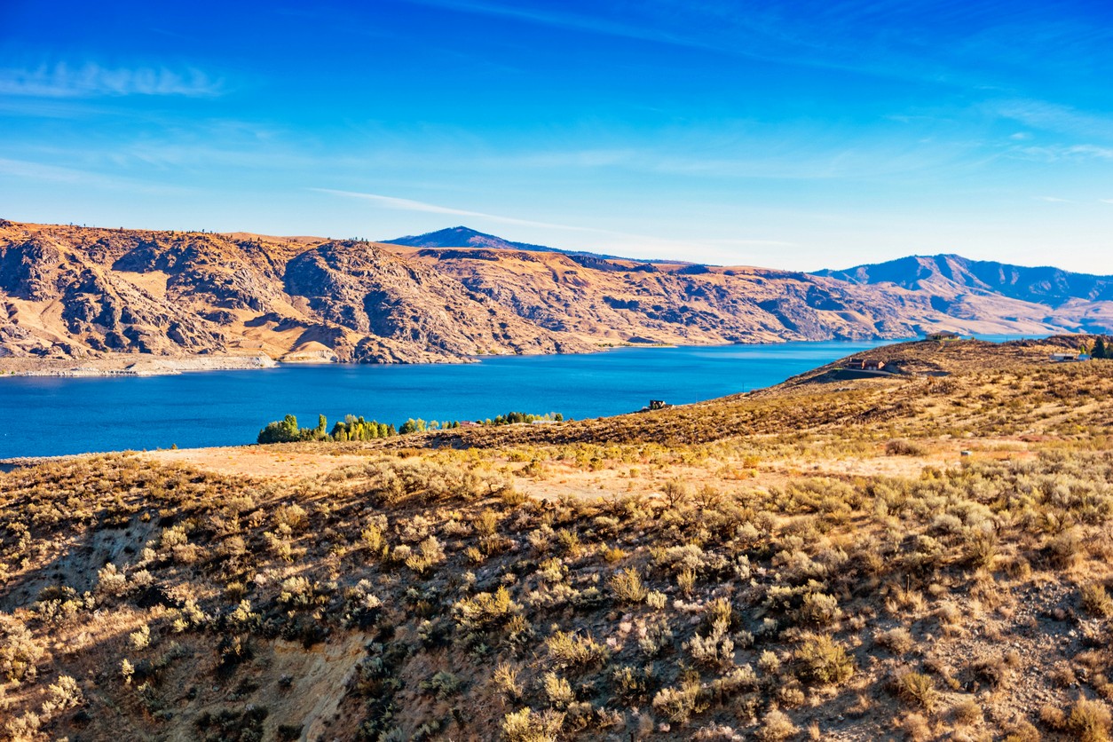 A flowing river between two hills