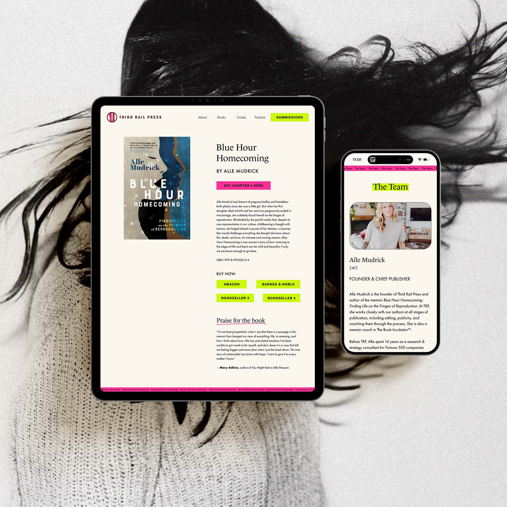 Top down view of a tablet and a mobile phone with an independent publishing company website on it, a black and white photo of a women shaking her head with her hair flying around is in the background