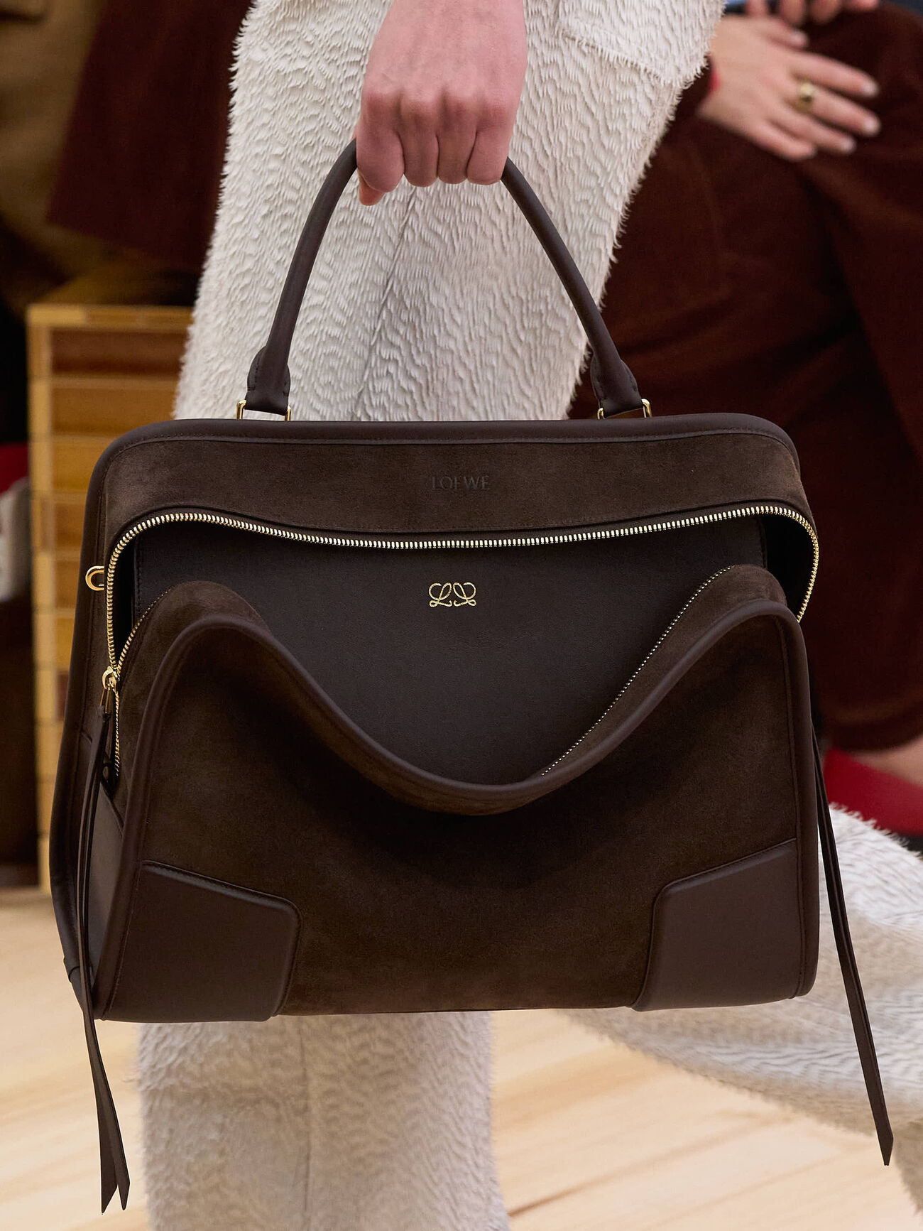Close-up of the Loewe Amazona 180 bag with the new logo anagram, showing the refined and minimal logo application