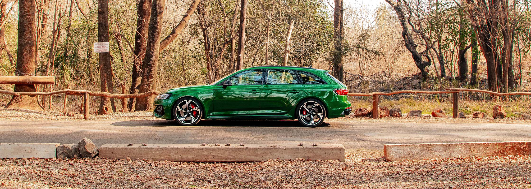 A wide shot image of a green Audi RS4