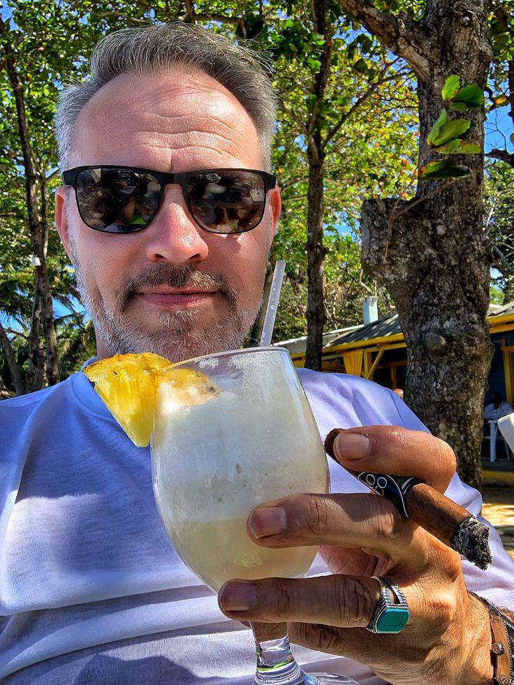 A person on a cozy studio smiling