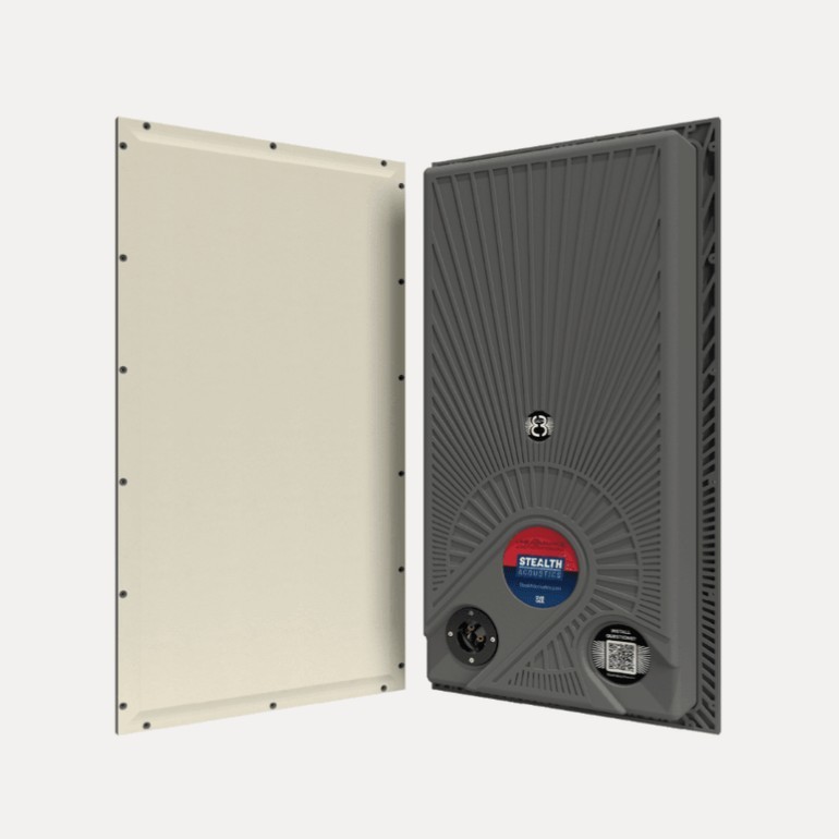 Gray speaker with detached beige cover.