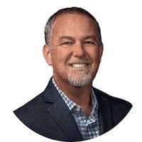 Image close up of male past client who is smiling.