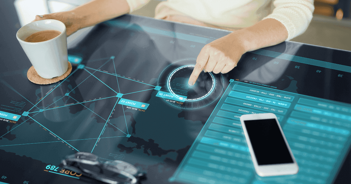 Person interacting with an augmented reality interface on a digital table