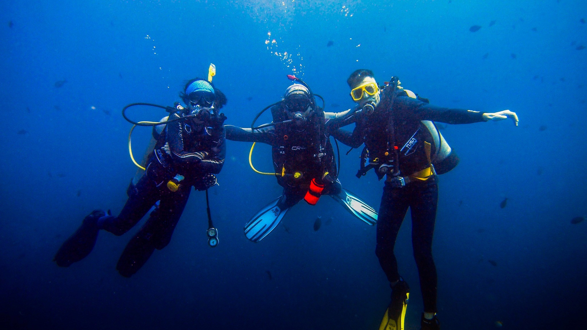 a pool with a table and chairs next to it