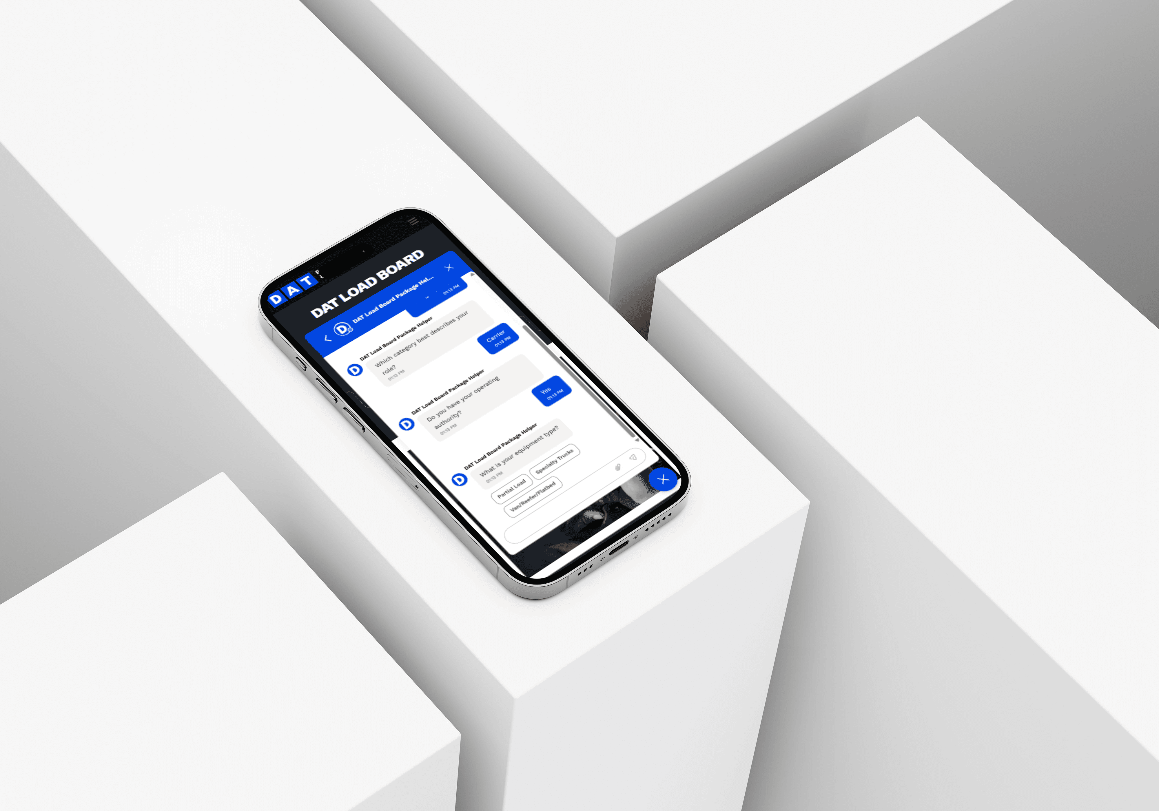 a cell phone leaning on boxes