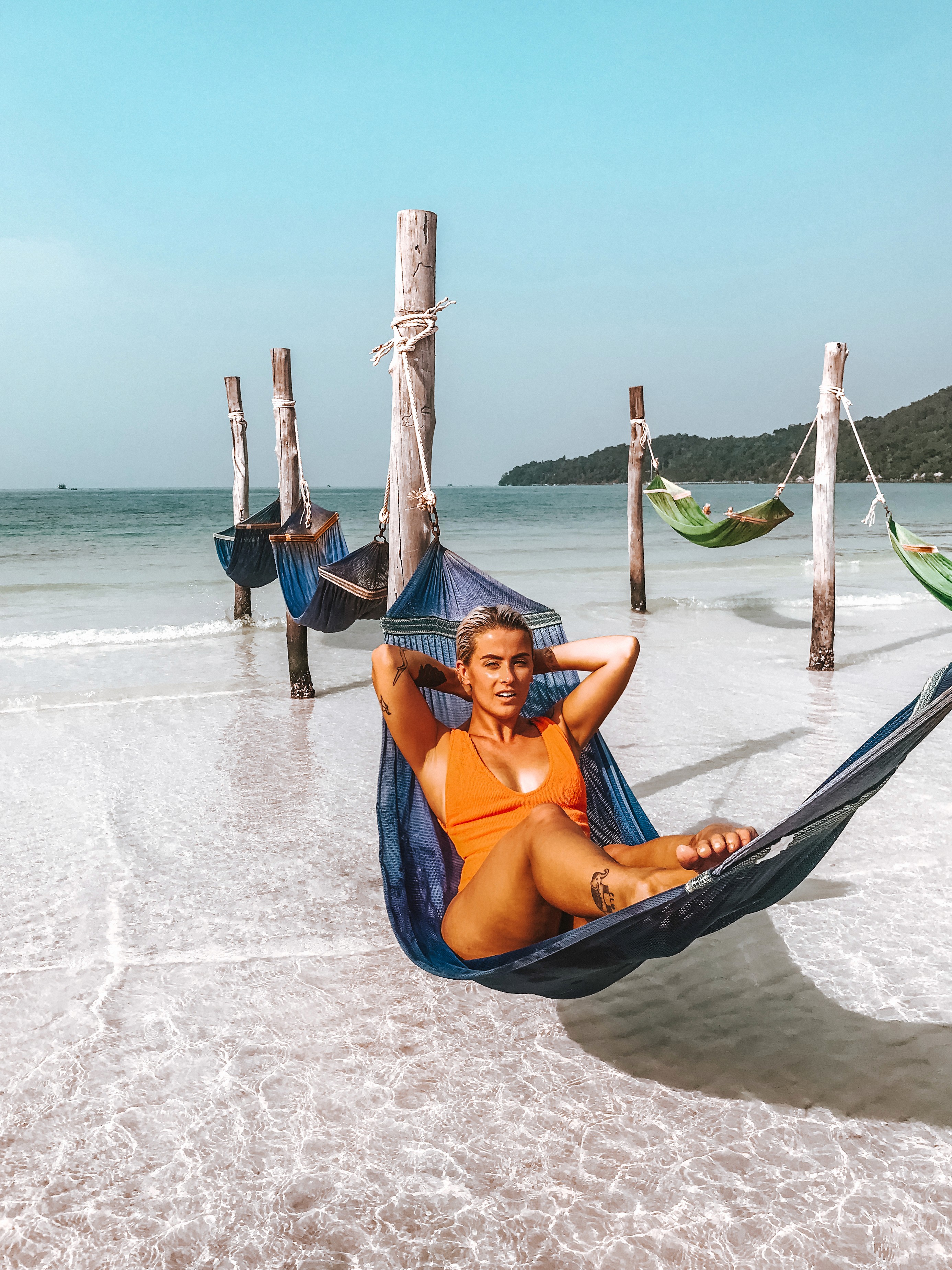 Girl on hammock in sea