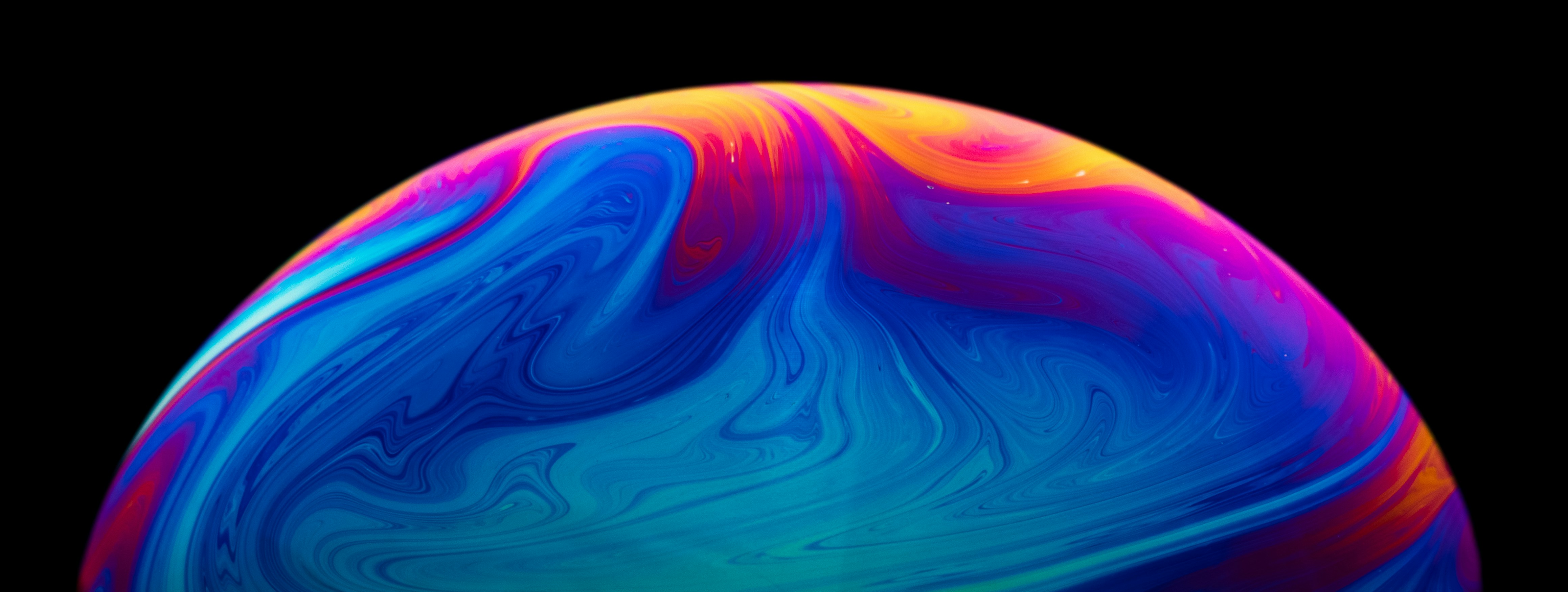 a blurry image of a yellow and purple background