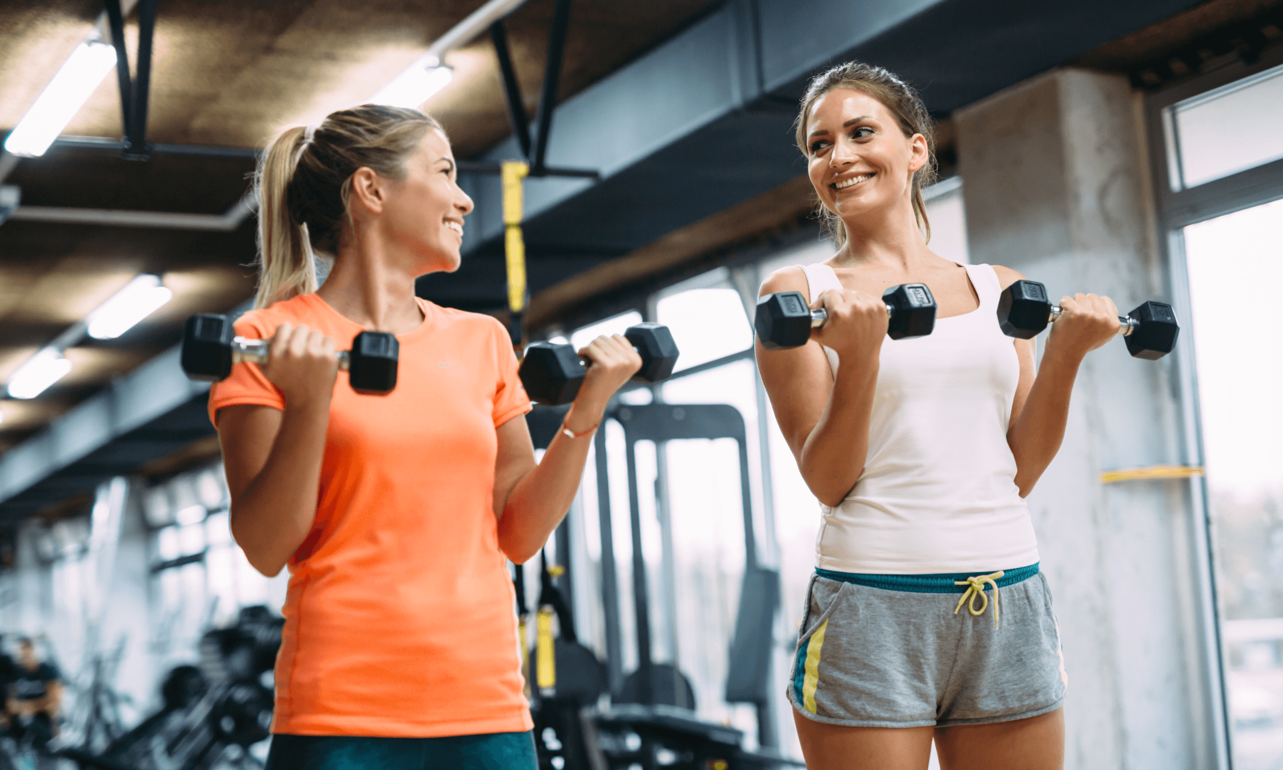 two woman exercing together