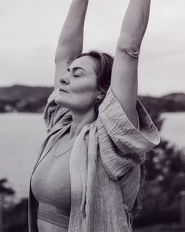 Woman doing yoga in the wild