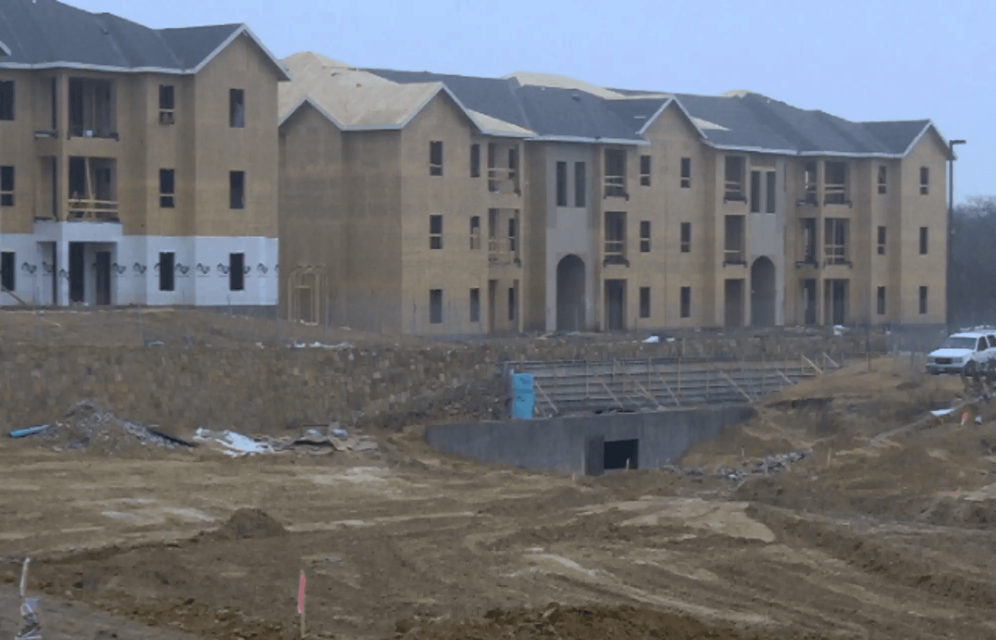 people working on building during daytime