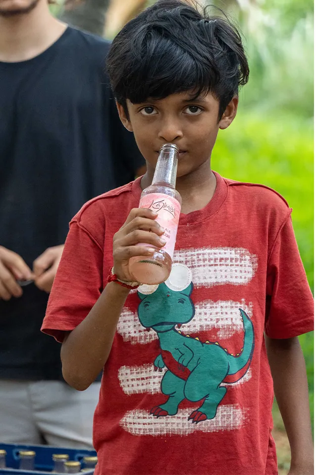 boy drinking kajimba