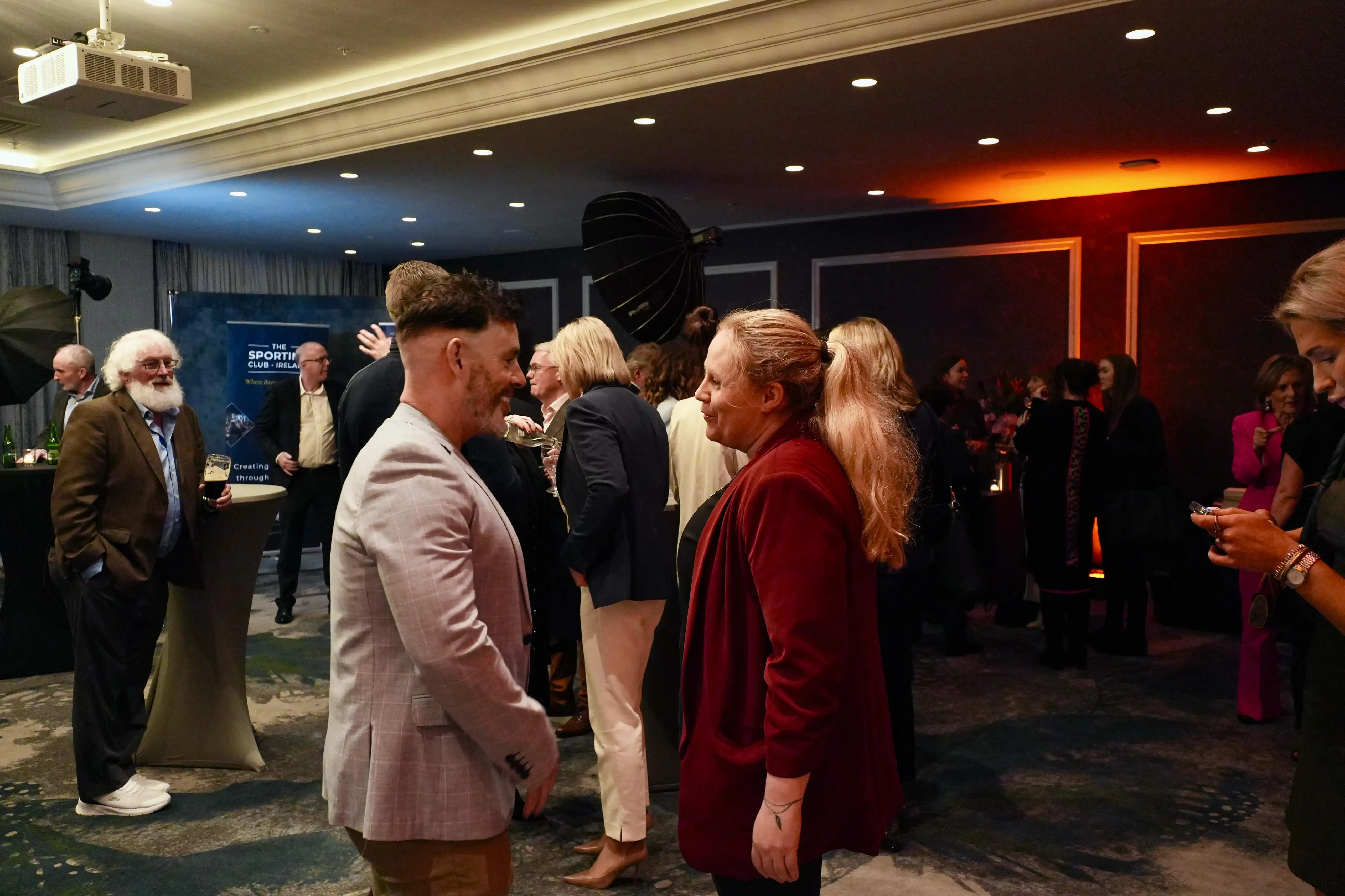 MArk brandon and fiona hayes in conversation at a sporting club ireland event