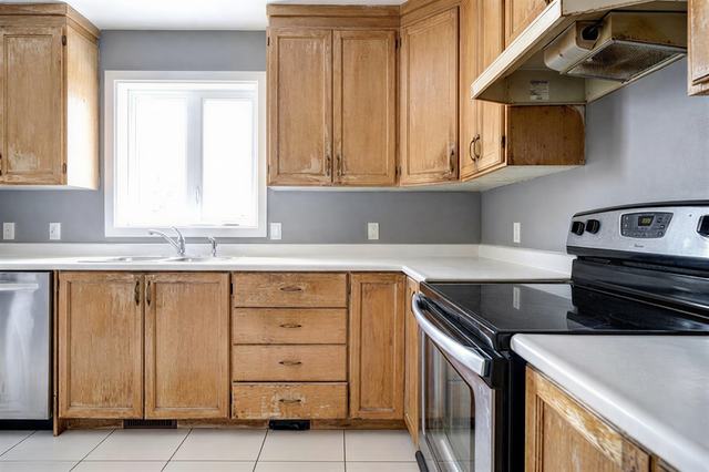 Cabinet Refinish & Backsplash — before