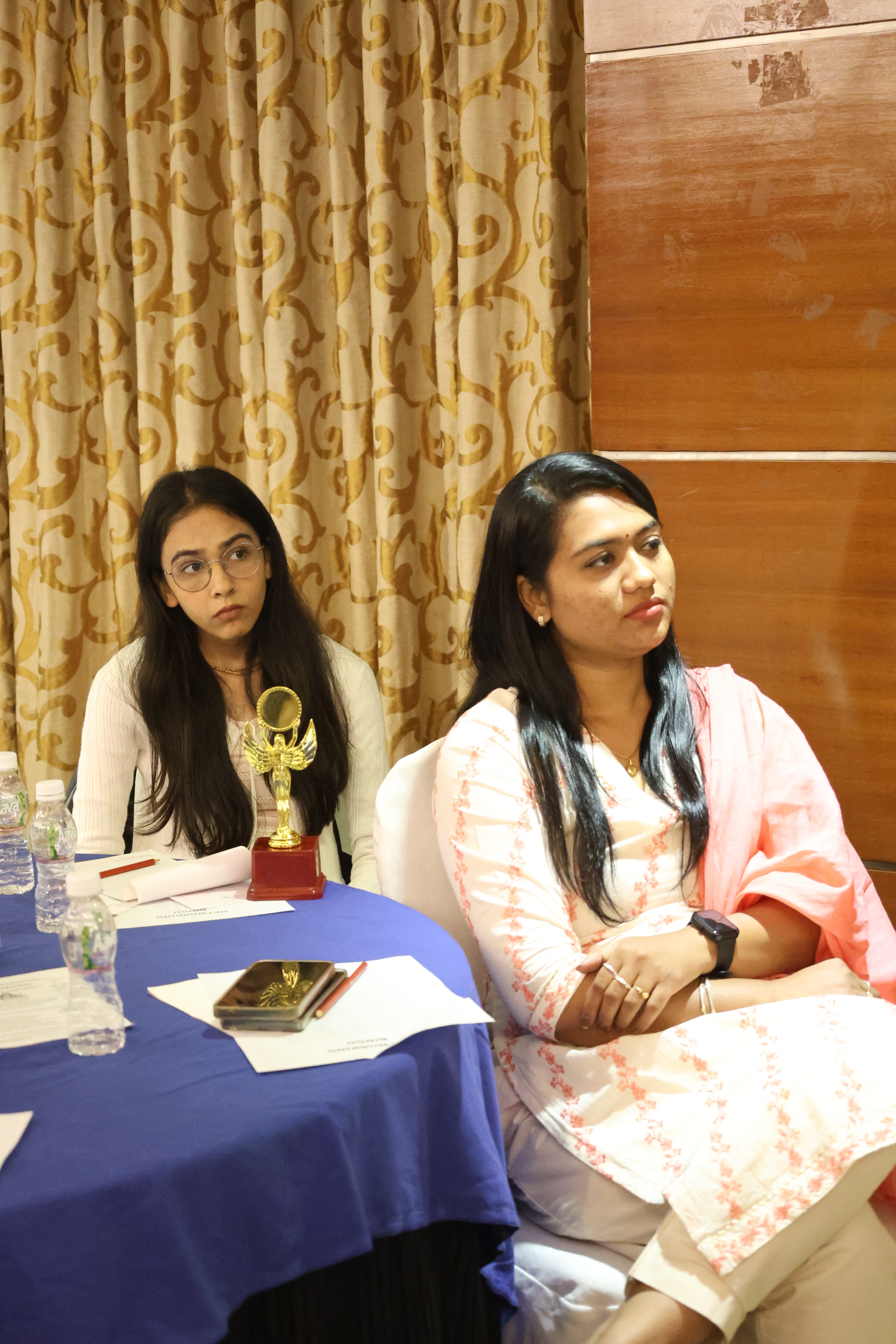 A Man Talking using Microphone in the Conference Room