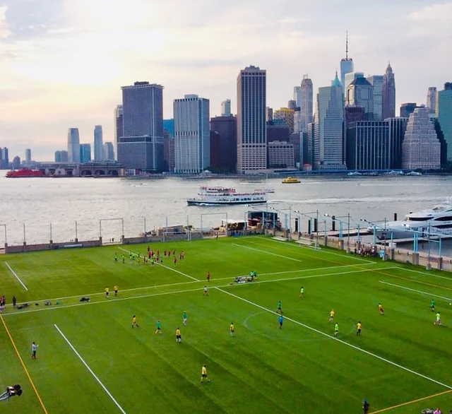 Soccer field with NYC skyline in background