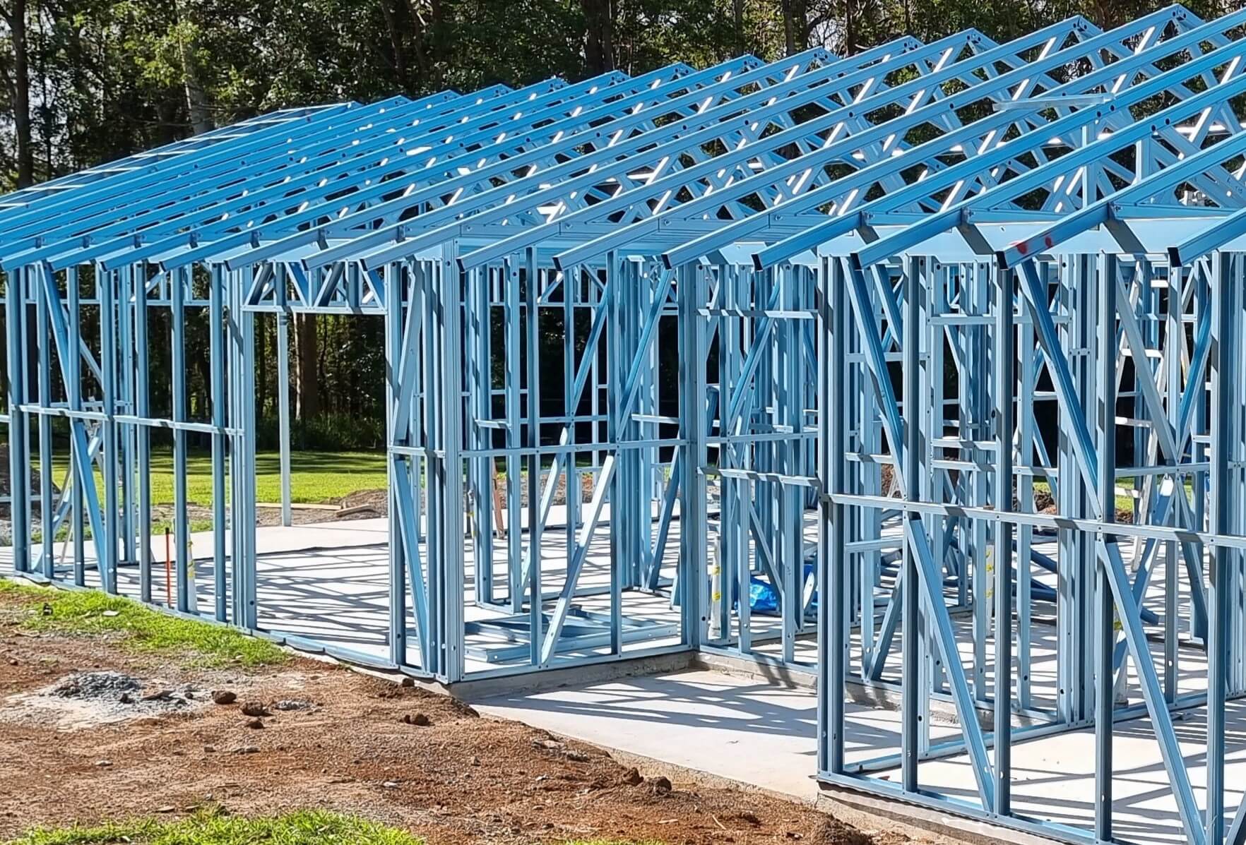 Ohana plumbing clearing a blocked drain at a house.