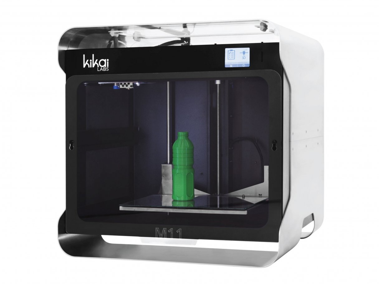 Rooftops of a coastal town with the sea in background