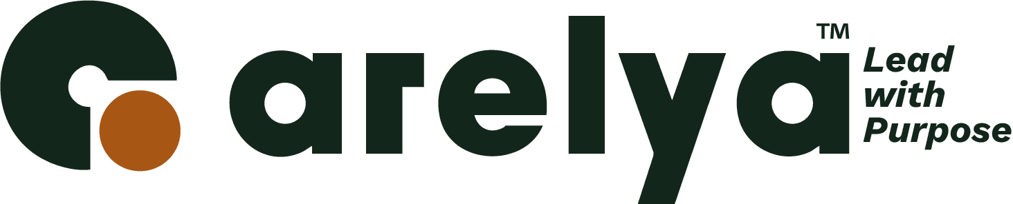 ESG consultant at Arelya smiling in modern office, supporting companies with CSRD and sustainability reporting